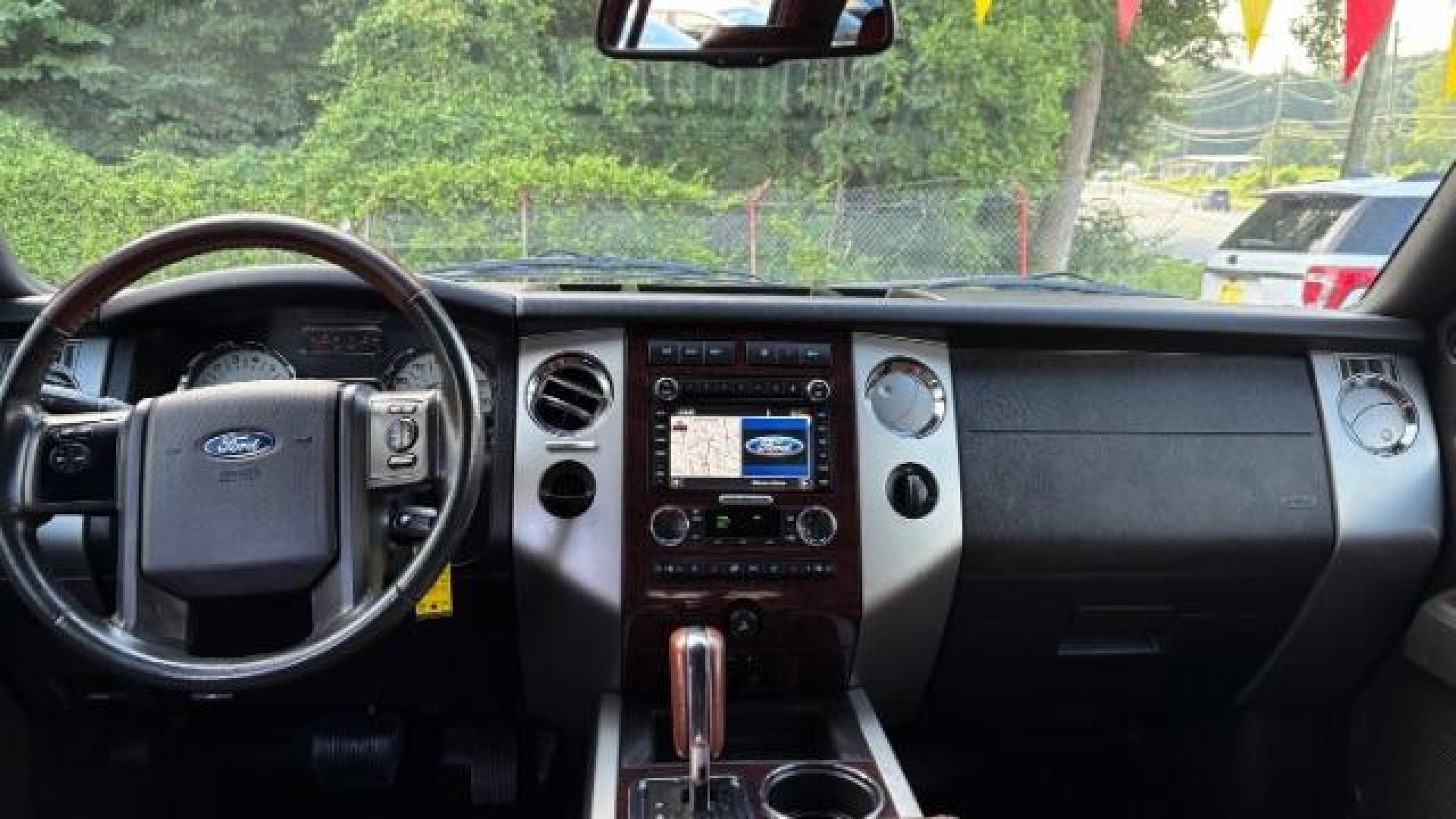 2014 Black Ford Expedition King Ranch (1FMJU1H55EE) with an Triton 5.4L V-8 variable valve control engine, located at 1806 Veterans Memorial Hwy SW, Austell, GA, 30168, (770) 944-9558, 33.817959, -84.606987 - Photo#7