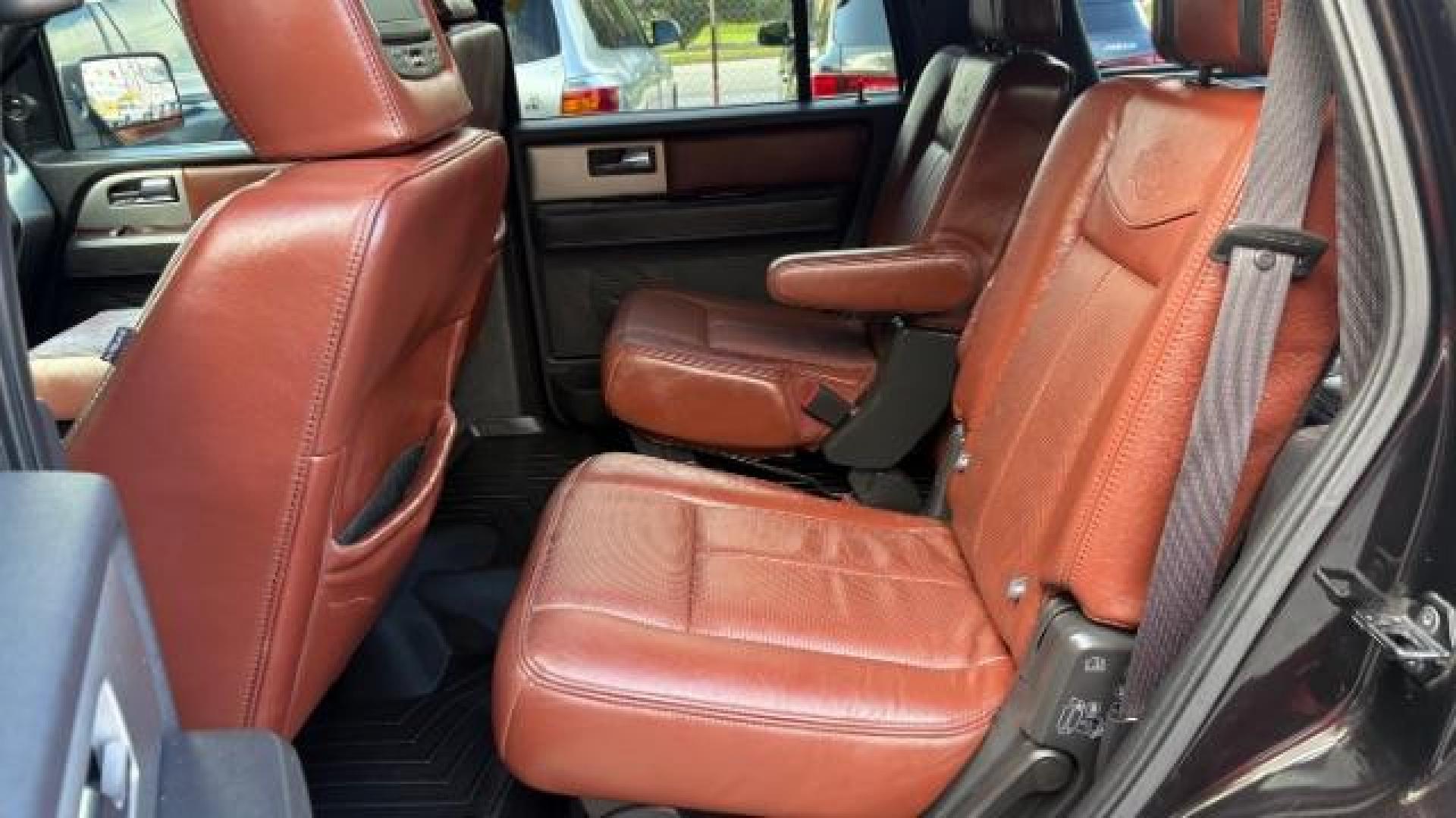 2014 Black Ford Expedition King Ranch (1FMJU1H55EE) with an Triton 5.4L V-8 variable valve control engine, located at 1806 Veterans Memorial Hwy SW, Austell, GA, 30168, (770) 944-9558, 33.817959, -84.606987 - Photo#8