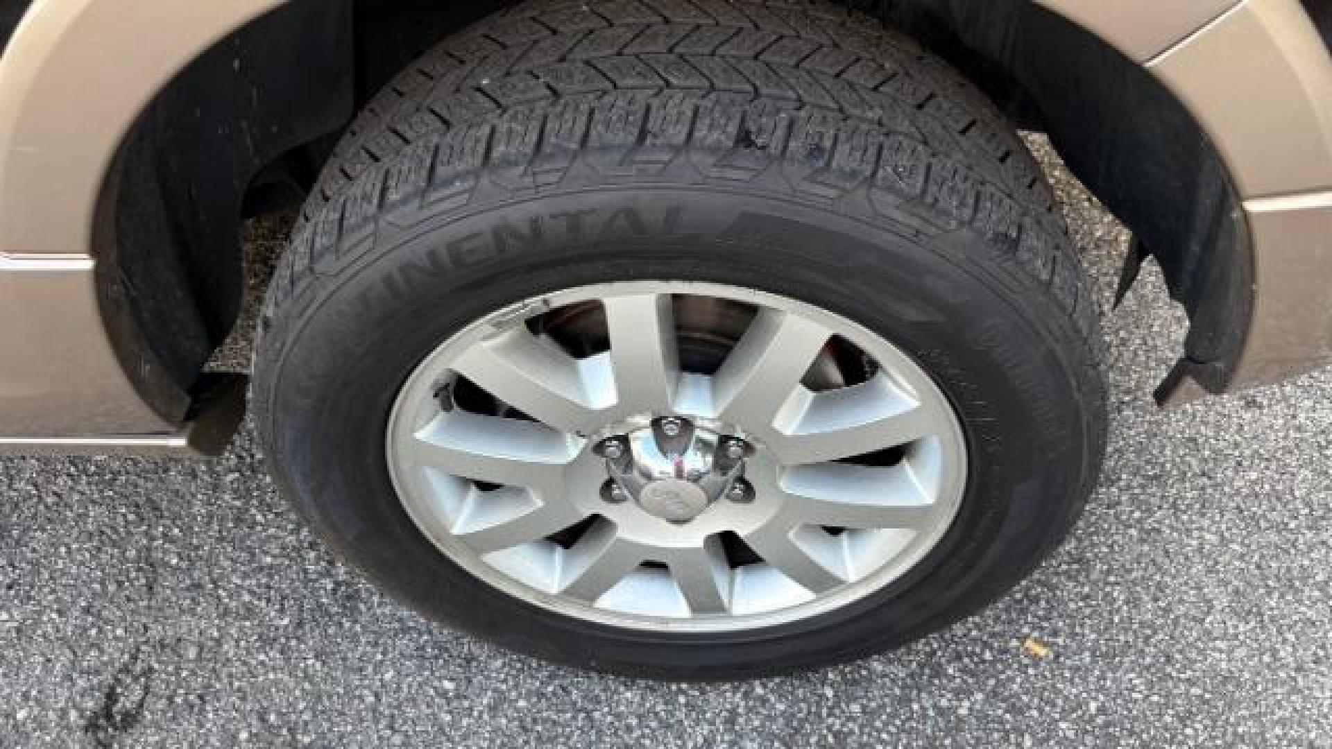 2014 Black Ford Expedition King Ranch (1FMJU1H55EE) with an Triton 5.4L V-8 variable valve control engine, located at 1806 Veterans Memorial Hwy SW, Austell, GA, 30168, (770) 944-9558, 33.817959, -84.606987 - Photo#22