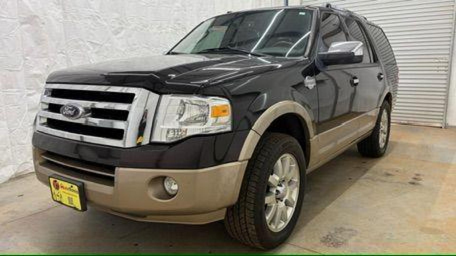 2014 Black Ford Expedition King Ranch (1FMJU1H55EE) with an Triton 5.4L V-8 variable valve control engine, located at 1806 Veterans Memorial Hwy SW, Austell, GA, 30168, (770) 944-9558, 33.817959, -84.606987 - Photo#0