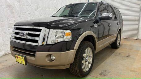 2014 Black Ford Expedition King Ranch (1FMJU1H55EE) with an Triton 5.4L V-8 variable valve control engine, located at 1806 Veterans Memorial Hwy SW, Austell, GA, 30168, (770) 944-9558, 33.817959, -84.606987 - Photo#0