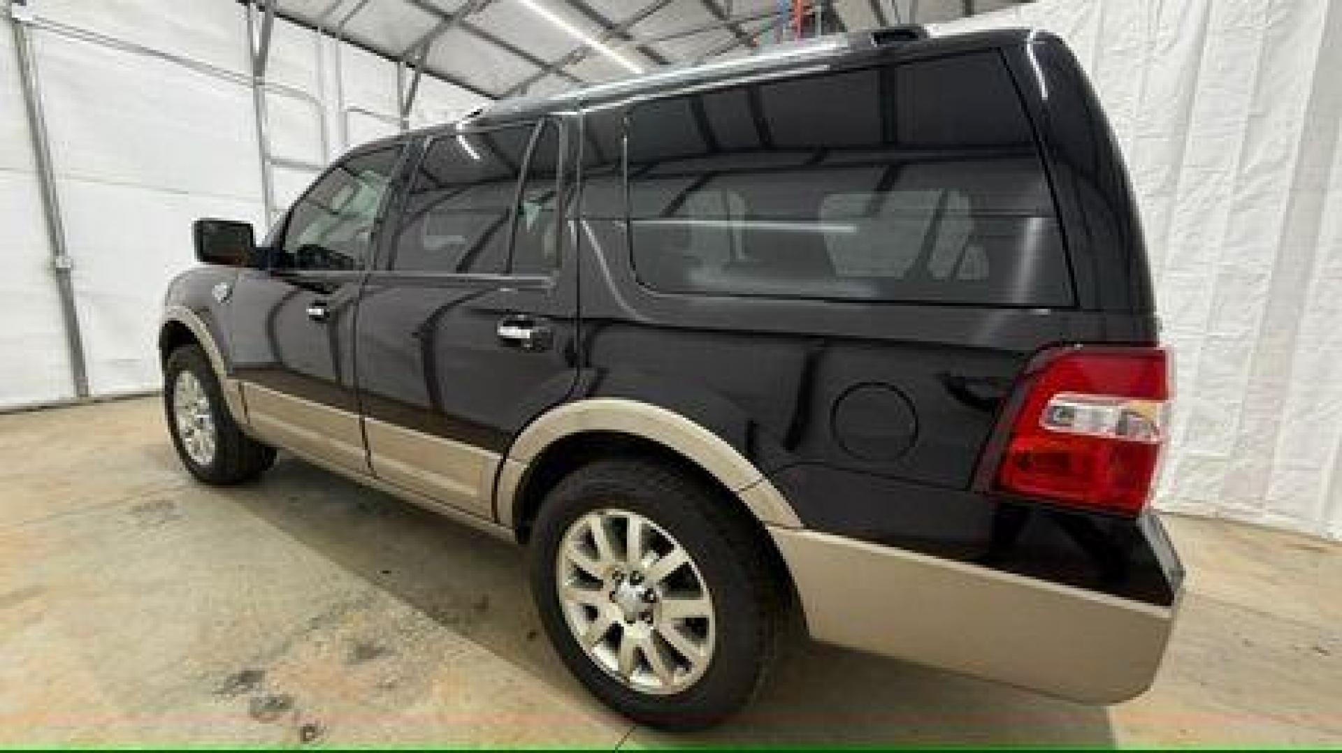 2014 Black Ford Expedition King Ranch (1FMJU1H55EE) with an Triton 5.4L V-8 variable valve control engine, located at 1806 Veterans Memorial Hwy SW, Austell, GA, 30168, (770) 944-9558, 33.817959, -84.606987 - Photo#2