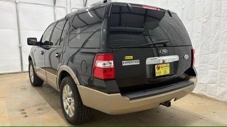 2014 Black Ford Expedition King Ranch (1FMJU1H55EE) with an Triton 5.4L V-8 variable valve control engine, located at 1806 Veterans Memorial Hwy SW, Austell, GA, 30168, (770) 944-9558, 33.817959, -84.606987 - Photo#3