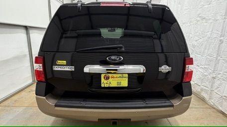 2014 Black Ford Expedition King Ranch (1FMJU1H55EE) with an Triton 5.4L V-8 variable valve control engine, located at 1806 Veterans Memorial Hwy SW, Austell, GA, 30168, (770) 944-9558, 33.817959, -84.606987 - Photo#4