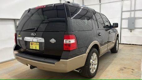2014 Black Ford Expedition King Ranch (1FMJU1H55EE) with an Triton 5.4L V-8 variable valve control engine, located at 1806 Veterans Memorial Hwy SW, Austell, GA, 30168, (770) 944-9558, 33.817959, -84.606987 - Photo#5