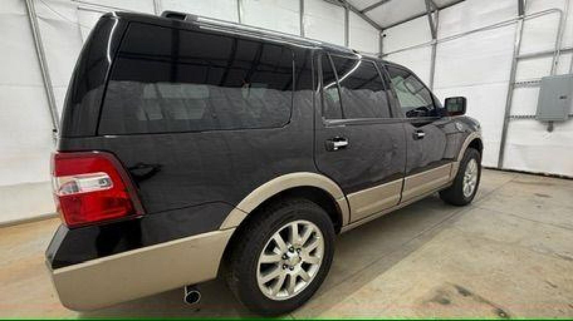 2014 Black Ford Expedition King Ranch (1FMJU1H55EE) with an Triton 5.4L V-8 variable valve control engine, located at 1806 Veterans Memorial Hwy SW, Austell, GA, 30168, (770) 944-9558, 33.817959, -84.606987 - Photo#6