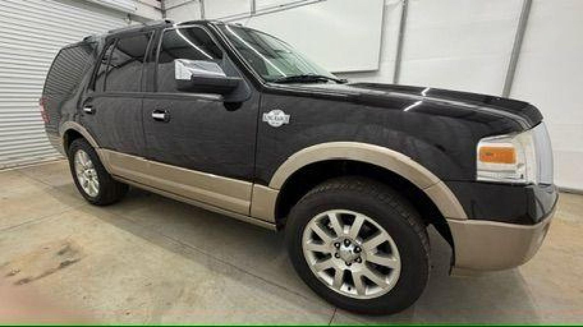 2014 Black Ford Expedition King Ranch (1FMJU1H55EE) with an Triton 5.4L V-8 variable valve control engine, located at 1806 Veterans Memorial Hwy SW, Austell, GA, 30168, (770) 944-9558, 33.817959, -84.606987 - Photo#7