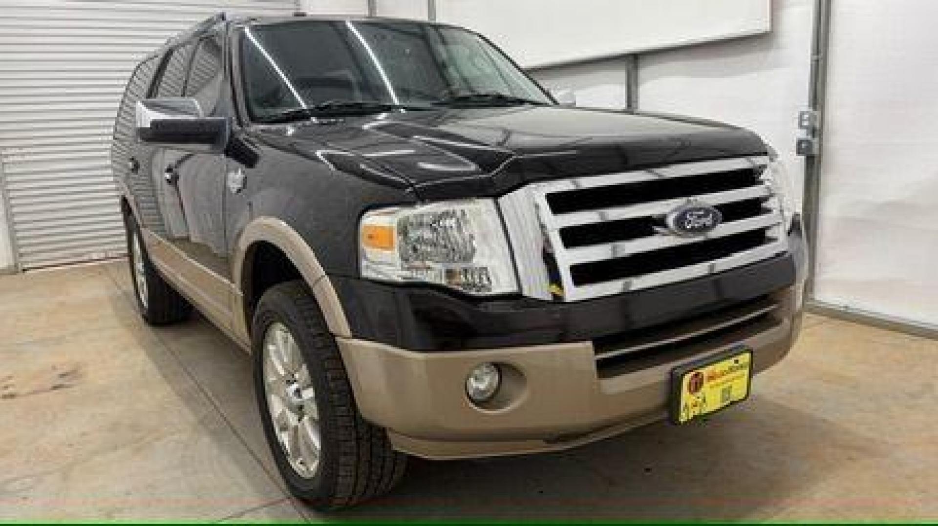 2014 Black Ford Expedition King Ranch (1FMJU1H55EE) with an Triton 5.4L V-8 variable valve control engine, located at 1806 Veterans Memorial Hwy SW, Austell, GA, 30168, (770) 944-9558, 33.817959, -84.606987 - Photo#8