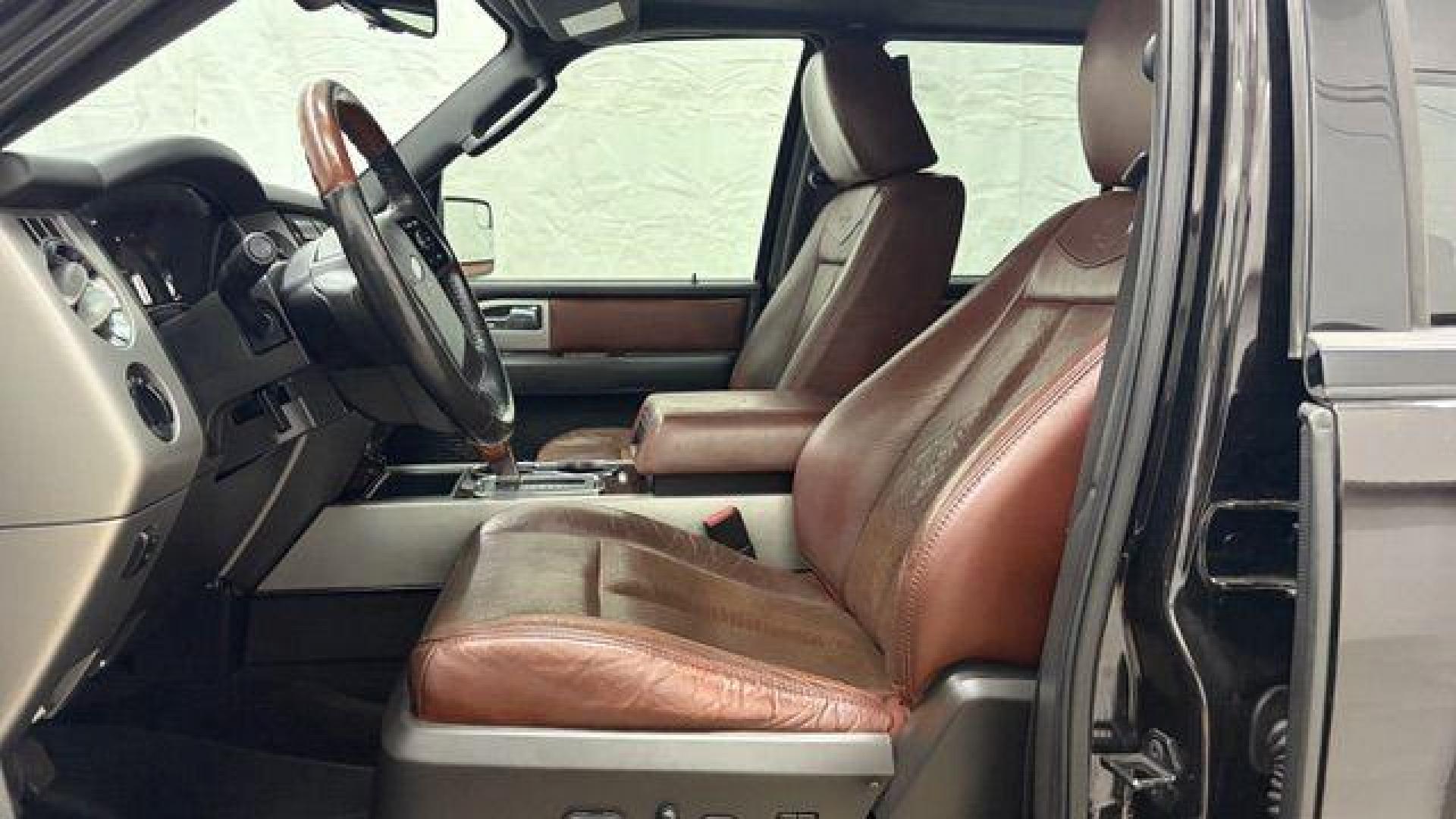 2014 Black Ford Expedition King Ranch (1FMJU1H55EE) with an Triton 5.4L V-8 variable valve control engine, located at 1806 Veterans Memorial Hwy SW, Austell, GA, 30168, (770) 944-9558, 33.817959, -84.606987 - Photo#12