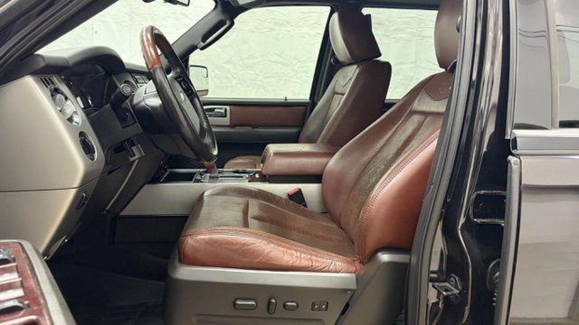 2014 Black Ford Expedition King Ranch (1FMJU1H55EE) with an Triton 5.4L V-8 variable valve control engine, located at 1806 Veterans Memorial Hwy SW, Austell, GA, 30168, (770) 944-9558, 33.817959, -84.606987 - Photo#13