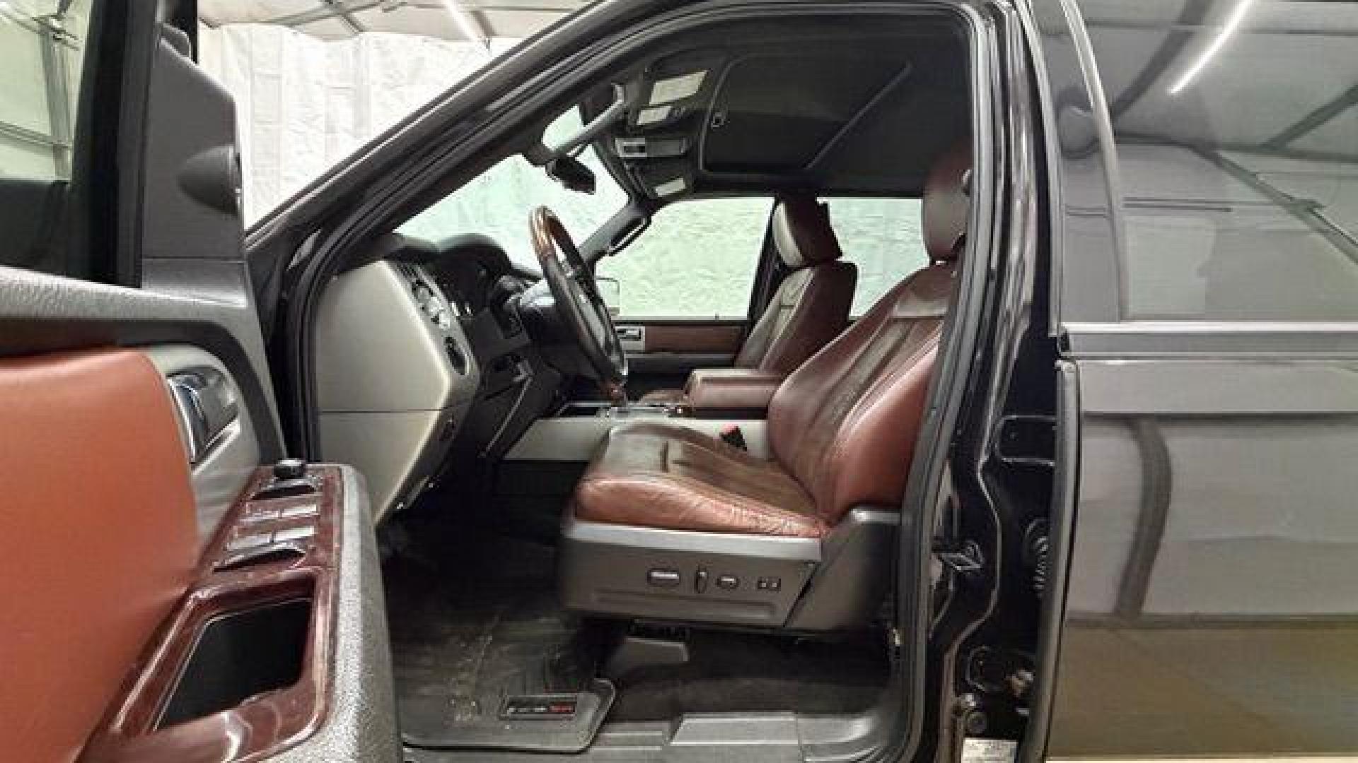 2014 Black Ford Expedition King Ranch (1FMJU1H55EE) with an Triton 5.4L V-8 variable valve control engine, located at 1806 Veterans Memorial Hwy SW, Austell, GA, 30168, (770) 944-9558, 33.817959, -84.606987 - Photo#14