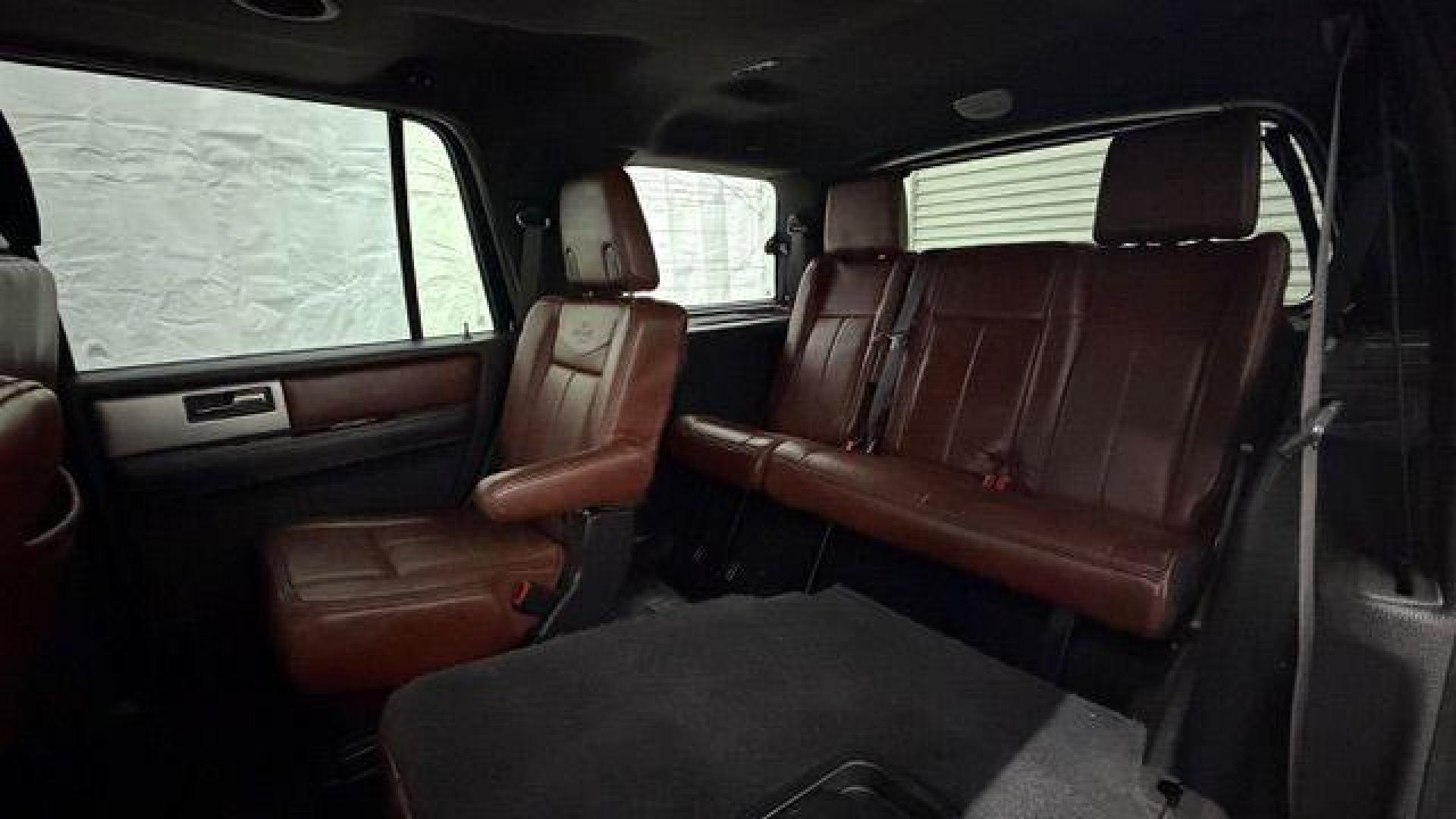 2014 Black Ford Expedition King Ranch (1FMJU1H55EE) with an Triton 5.4L V-8 variable valve control engine, located at 1806 Veterans Memorial Hwy SW, Austell, GA, 30168, (770) 944-9558, 33.817959, -84.606987 - Photo#17