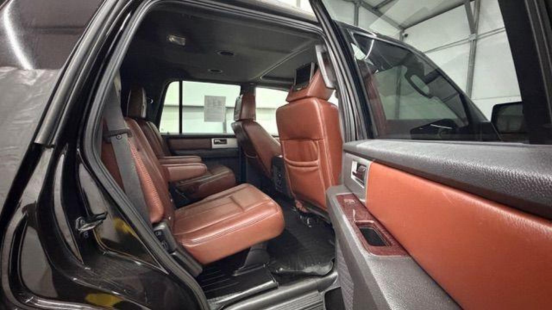 2014 Black Ford Expedition King Ranch (1FMJU1H55EE) with an Triton 5.4L V-8 variable valve control engine, located at 1806 Veterans Memorial Hwy SW, Austell, GA, 30168, (770) 944-9558, 33.817959, -84.606987 - Photo#19