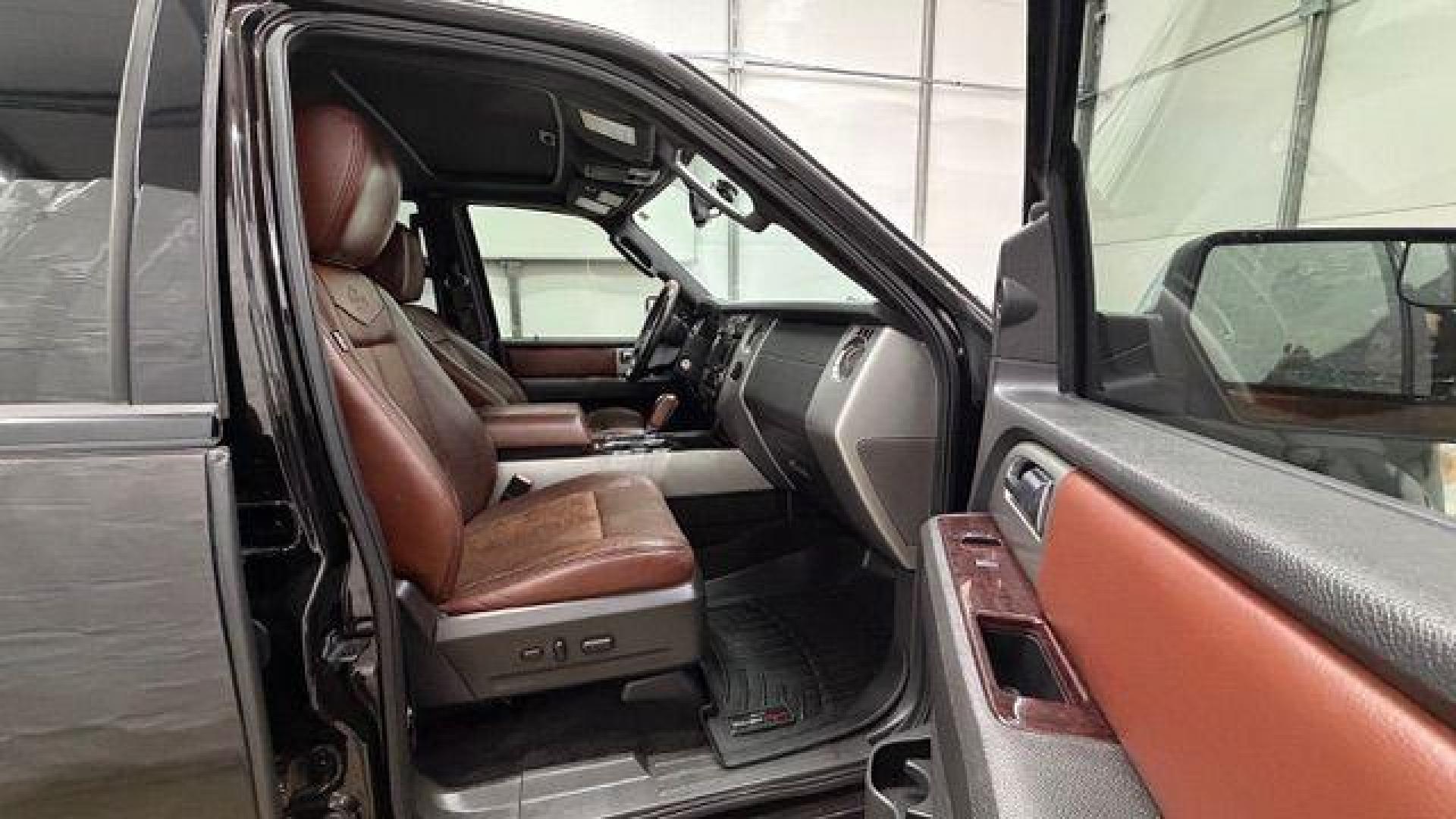 2014 Black Ford Expedition King Ranch (1FMJU1H55EE) with an Triton 5.4L V-8 variable valve control engine, located at 1806 Veterans Memorial Hwy SW, Austell, GA, 30168, (770) 944-9558, 33.817959, -84.606987 - Photo#20