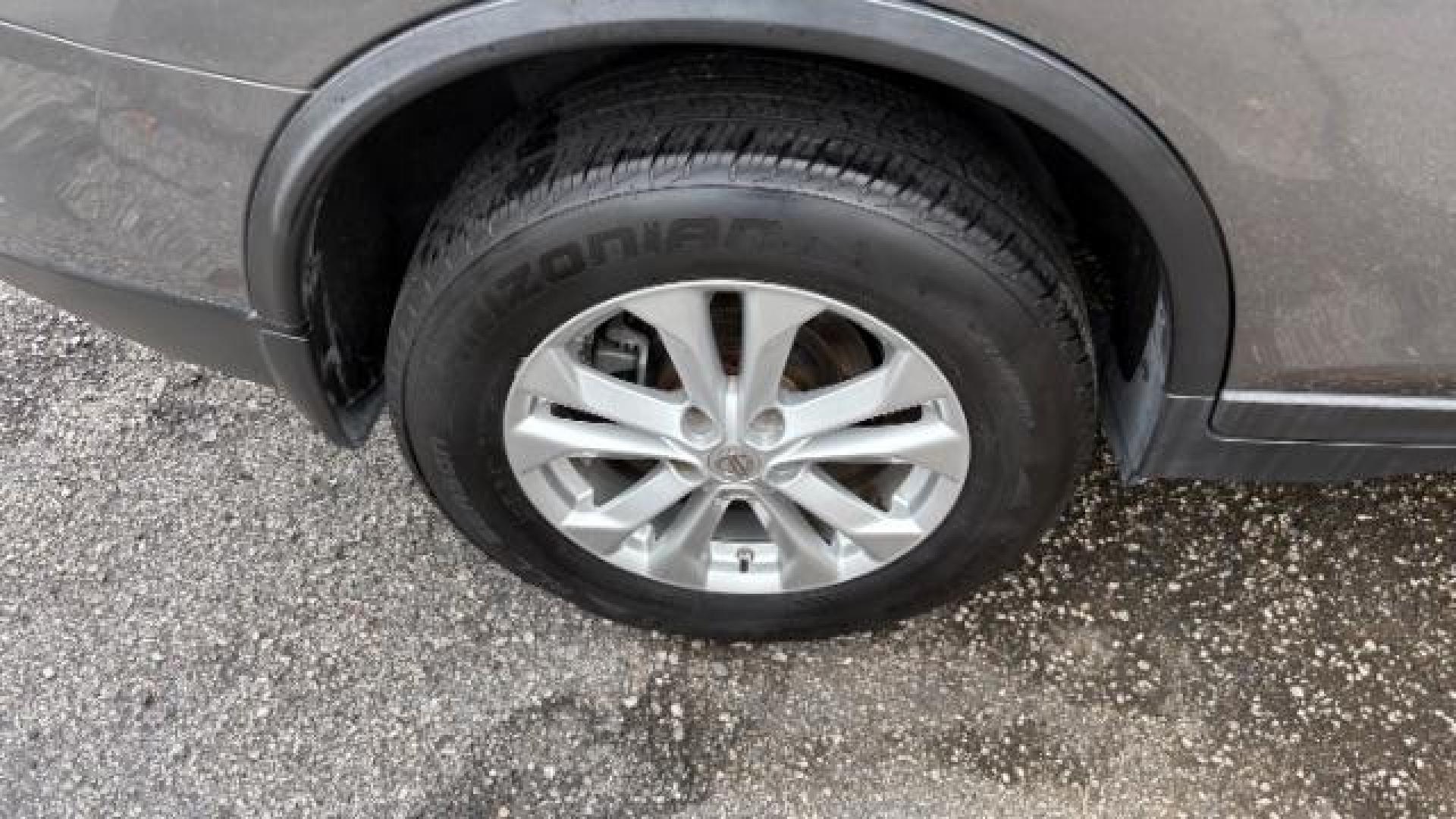 2016 Gray Nissan Rogue SV (KNMAT2MT9GP) with an 2.5L I-4 DOHC engine, located at 1806 Veterans Memorial Hwy SW, Austell, GA, 30168, (770) 944-9558, 33.817959, -84.606987 - Photo#18