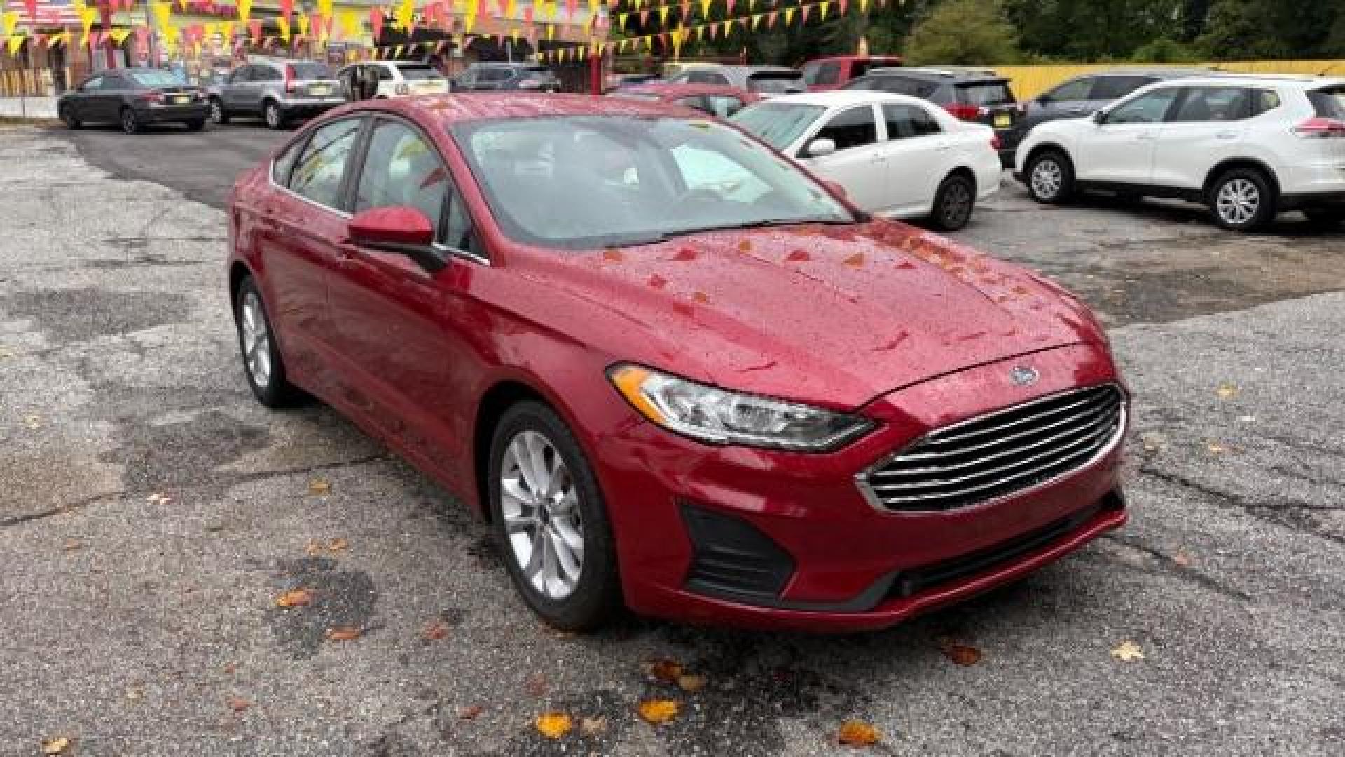 2020 RED Ford Fusion SE (3FA6P0HD3LR) , located at 1806 Veterans Memorial Hwy SW, Austell, GA, 30168, (770) 944-9558, 33.817959, -84.606987 - Photo#2