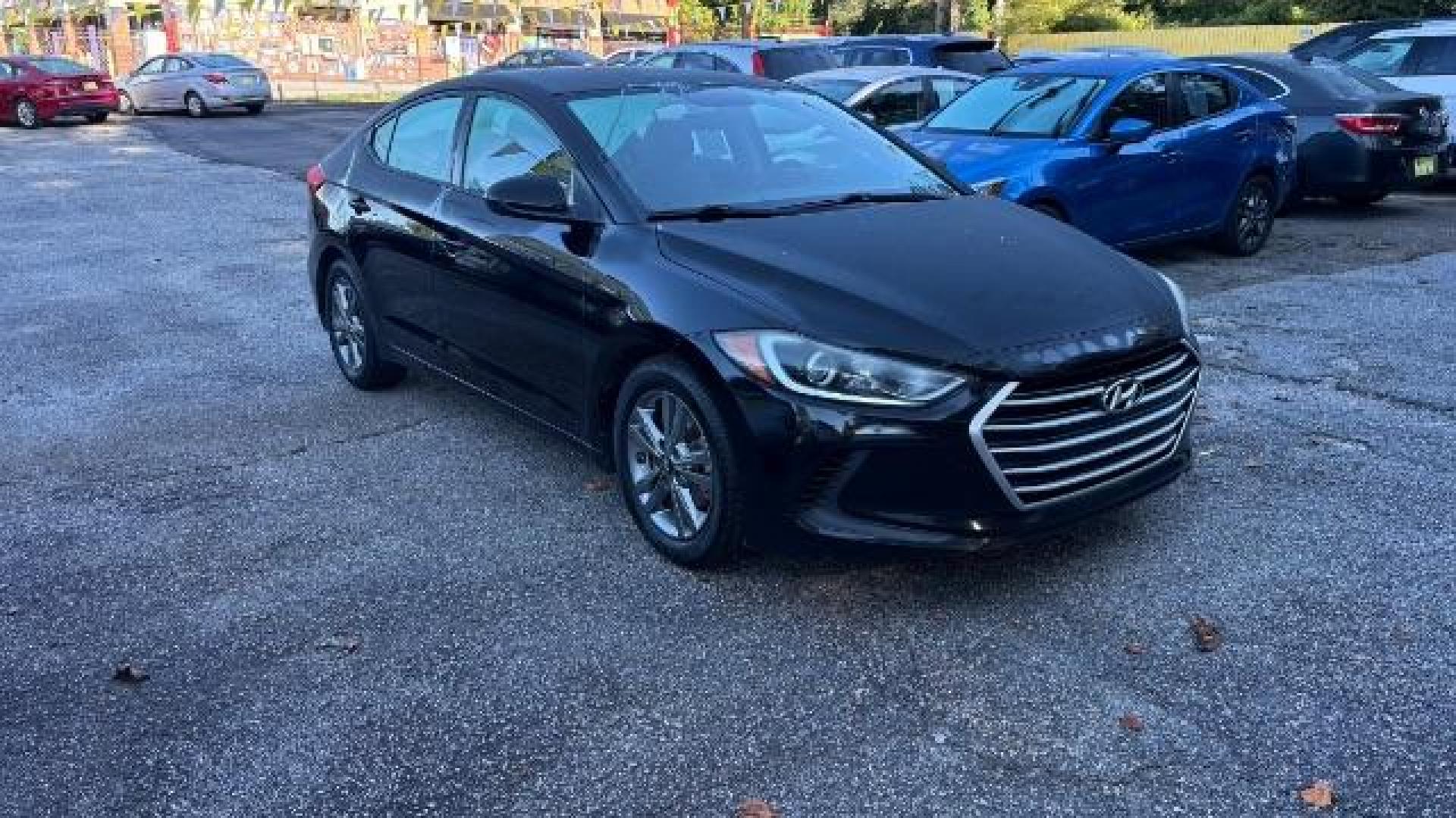 2017 Black Hyundai Elantra SE (5NPD84LF7HH) with an Nu 2L I-4 DOHC engine, located at 1806 Veterans Memorial Hwy SW, Austell, GA, 30168, (770) 944-9558, 33.817959, -84.606987 - Photo#2