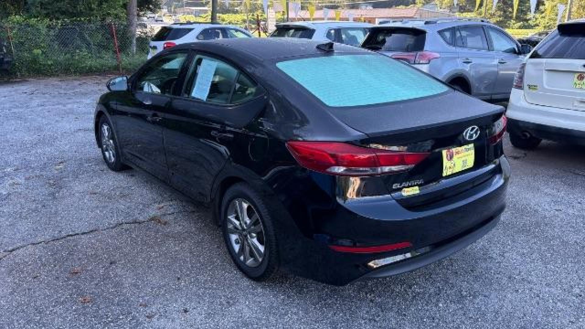 2017 Black Hyundai Elantra SE (5NPD84LF7HH) with an Nu 2L I-4 DOHC engine, located at 1806 Veterans Memorial Hwy SW, Austell, GA, 30168, (770) 944-9558, 33.817959, -84.606987 - Photo#3