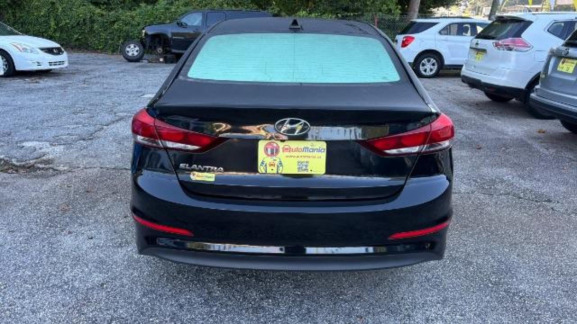 2017 Black Hyundai Elantra SE (5NPD84LF7HH) with an Nu 2L I-4 DOHC engine, located at 1806 Veterans Memorial Hwy SW, Austell, GA, 30168, (770) 944-9558, 33.817959, -84.606987 - Photo#4