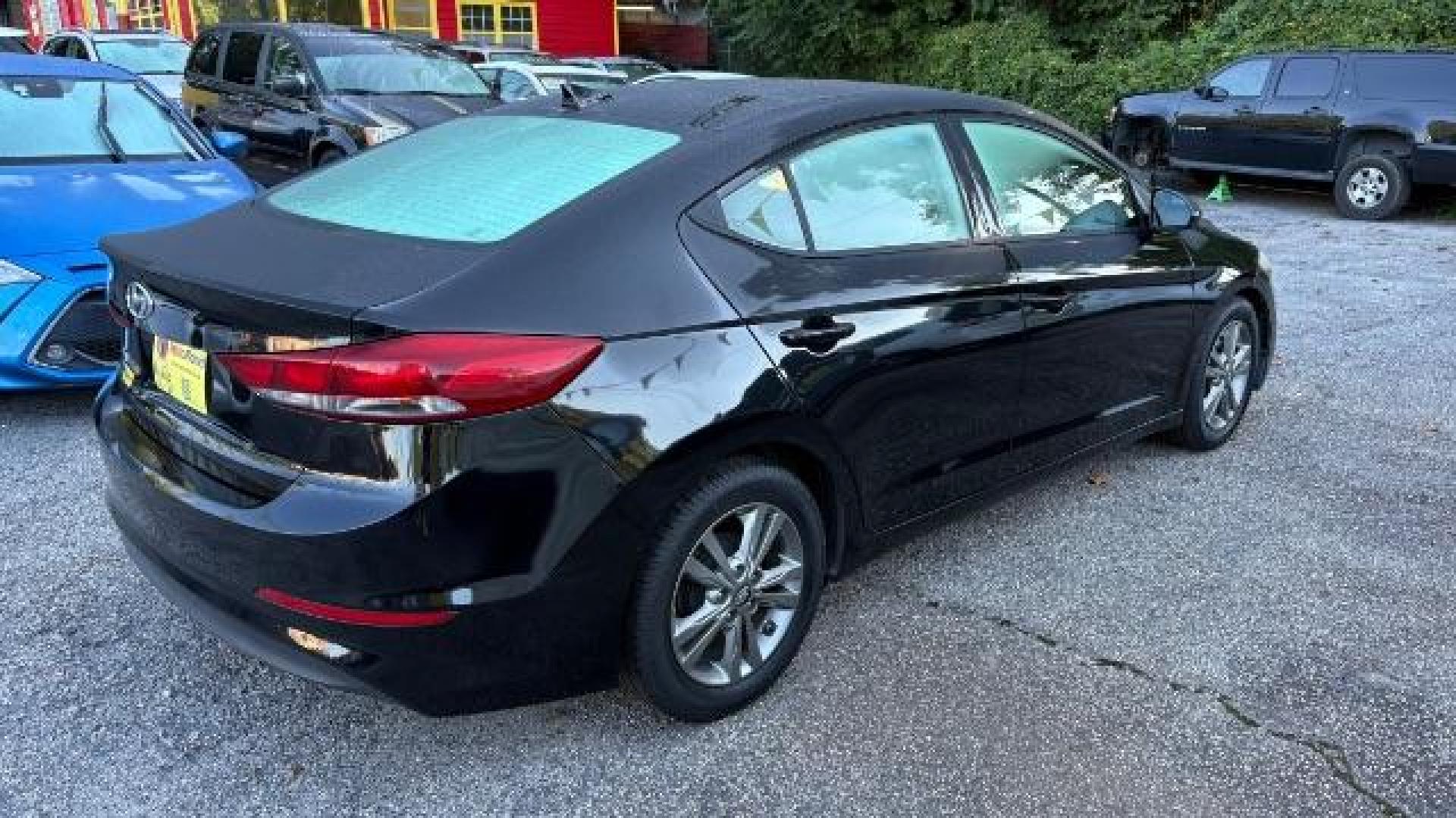 2017 Black Hyundai Elantra SE (5NPD84LF7HH) with an Nu 2L I-4 DOHC engine, located at 1806 Veterans Memorial Hwy SW, Austell, GA, 30168, (770) 944-9558, 33.817959, -84.606987 - Photo#5