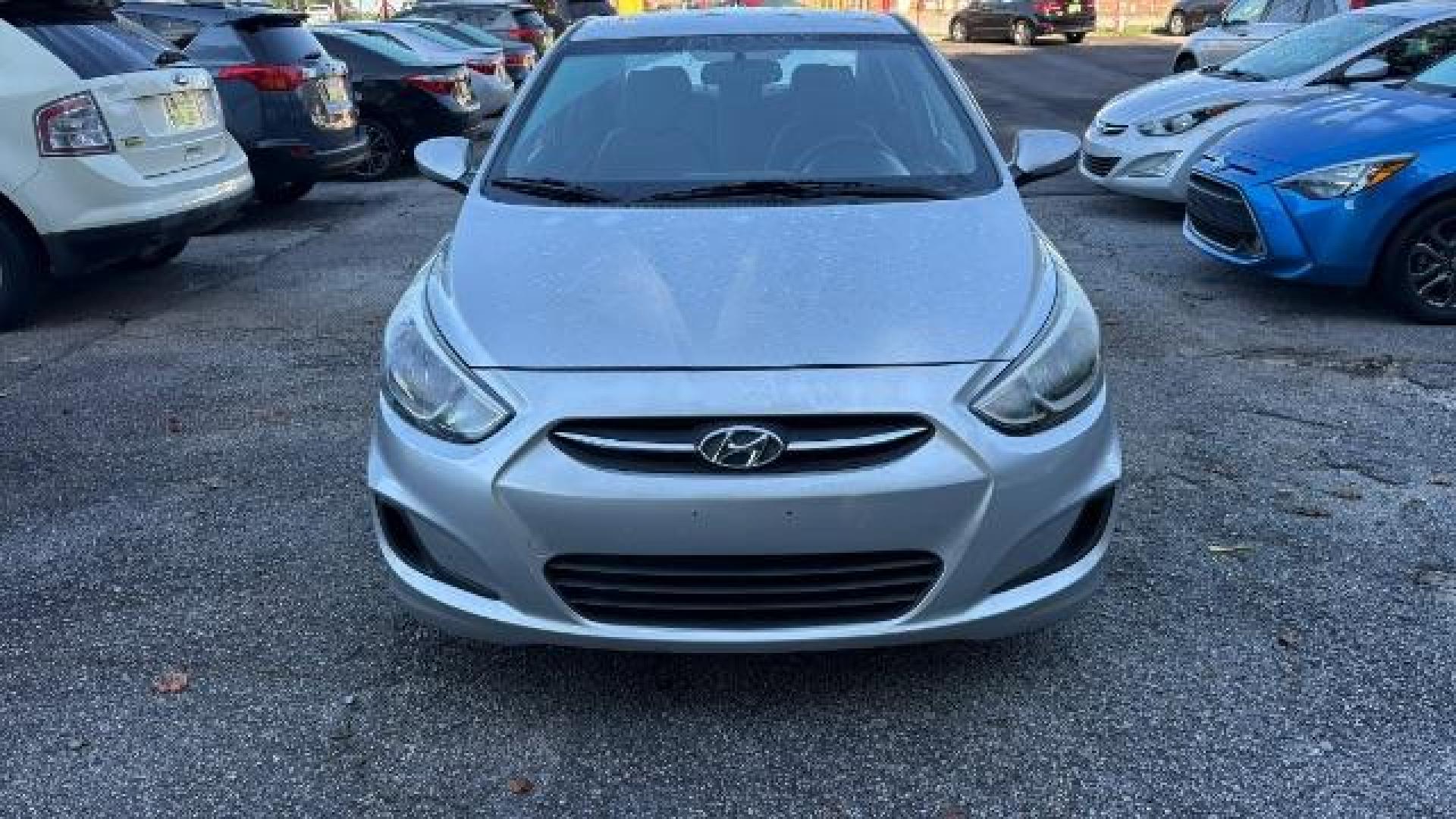 2015 Silver Hyundai Accent GLS (KMHCT4AE8FU) with an 1.6L I-4 gasoline direct injection engine, located at 1806 Veterans Memorial Hwy SW, Austell, GA, 30168, (770) 944-9558, 33.817959, -84.606987 - Photo#1