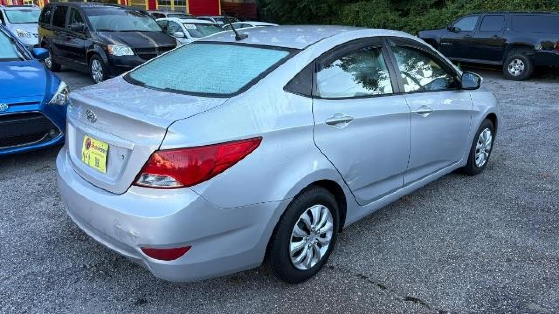 2015 Silver Hyundai Accent GLS (KMHCT4AE8FU) with an 1.6L I-4 gasoline direct injection engine, located at 1806 Veterans Memorial Hwy SW, Austell, GA, 30168, (770) 944-9558, 33.817959, -84.606987 - Photo#3