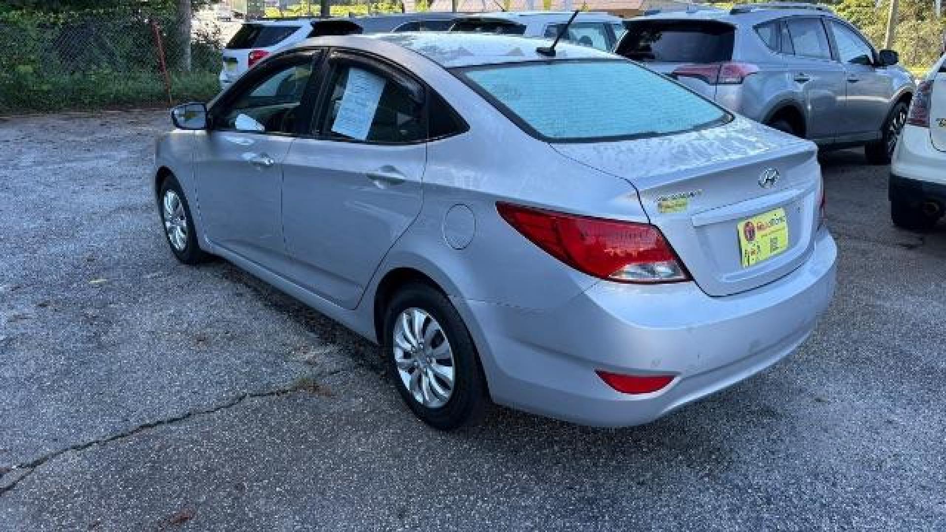 2015 Silver Hyundai Accent GLS (KMHCT4AE8FU) with an 1.6L I-4 gasoline direct injection engine, located at 1806 Veterans Memorial Hwy SW, Austell, GA, 30168, (770) 944-9558, 33.817959, -84.606987 - Photo#5