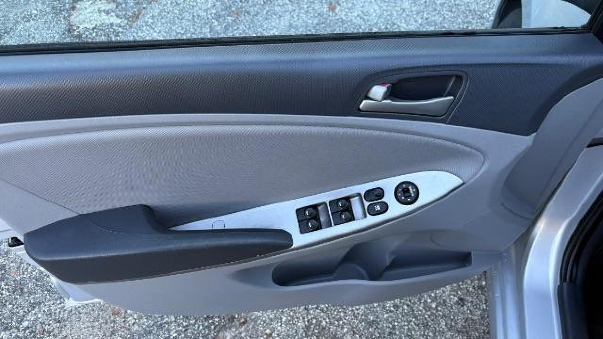 2015 Silver Hyundai Accent GLS (KMHCT4AE8FU) with an 1.6L I-4 gasoline direct injection engine, located at 1806 Veterans Memorial Hwy SW, Austell, GA, 30168, (770) 944-9558, 33.817959, -84.606987 - Photo#6