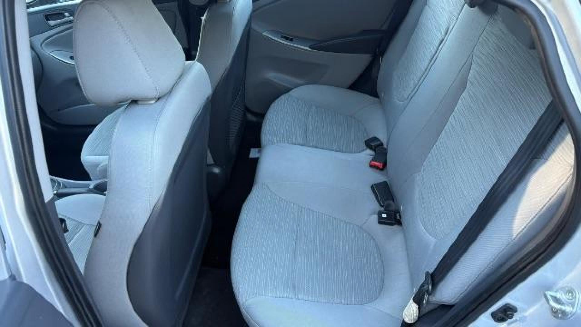 2015 Silver Hyundai Accent GLS (KMHCT4AE8FU) with an 1.6L I-4 gasoline direct injection engine, located at 1806 Veterans Memorial Hwy SW, Austell, GA, 30168, (770) 944-9558, 33.817959, -84.606987 - Photo#8