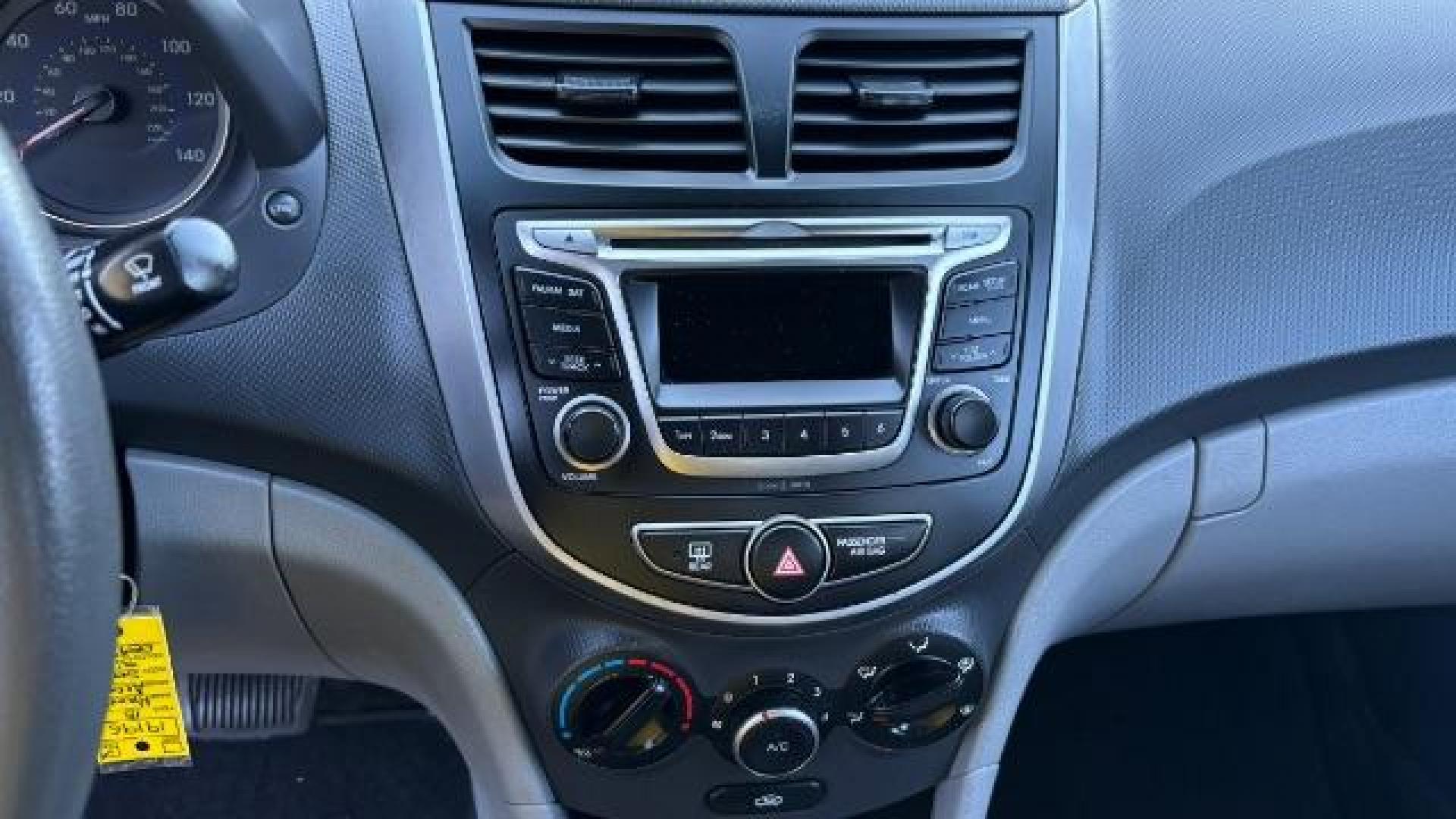 2015 Silver Hyundai Accent GLS (KMHCT4AE8FU) with an 1.6L I-4 gasoline direct injection engine, located at 1806 Veterans Memorial Hwy SW, Austell, GA, 30168, (770) 944-9558, 33.817959, -84.606987 - Photo#9