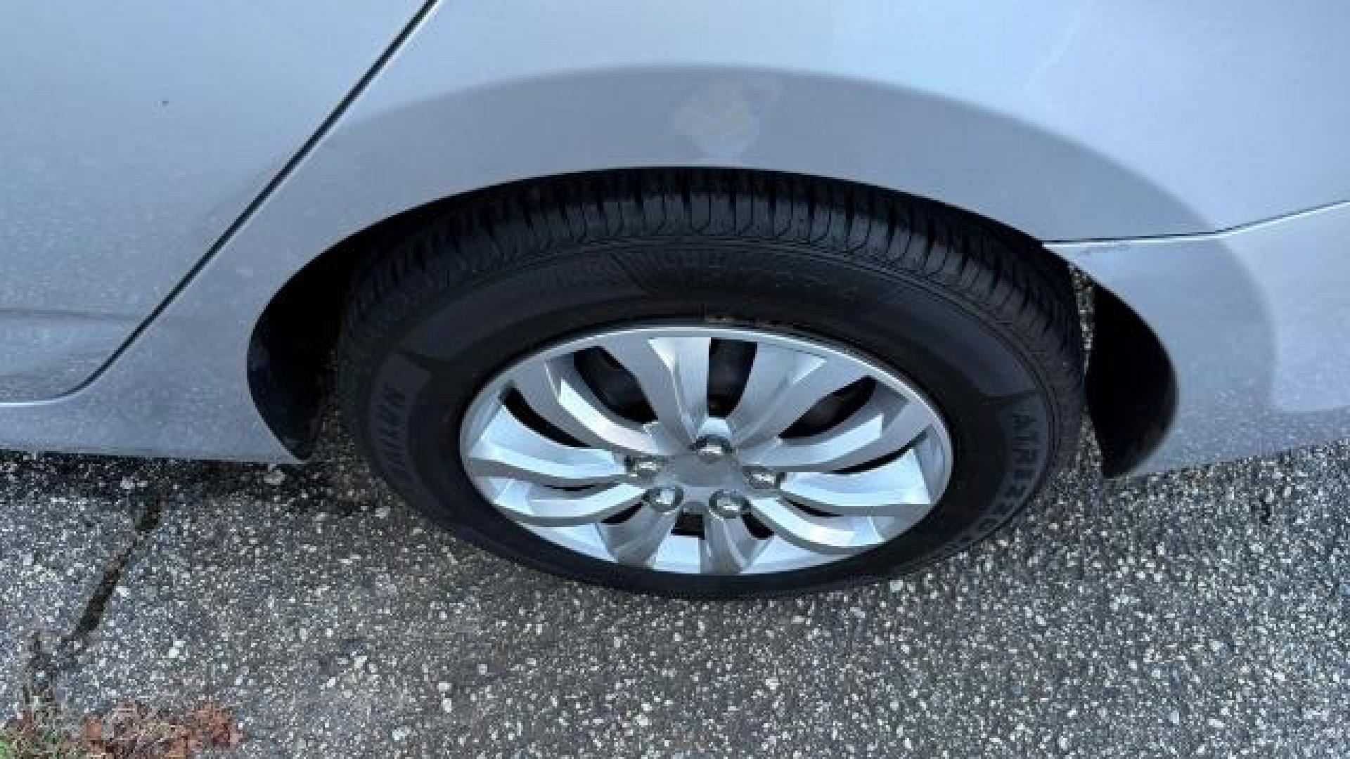 2015 Silver Hyundai Accent GLS (KMHCT4AE8FU) with an 1.6L I-4 gasoline direct injection engine, located at 1806 Veterans Memorial Hwy SW, Austell, GA, 30168, (770) 944-9558, 33.817959, -84.606987 - Photo#11