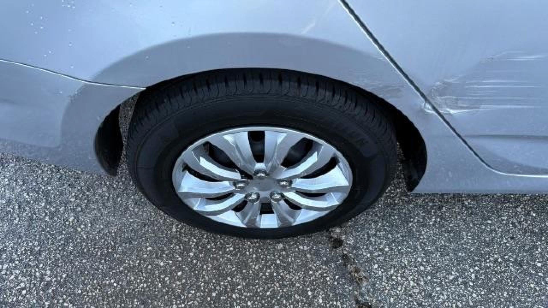 2015 Silver Hyundai Accent GLS (KMHCT4AE8FU) with an 1.6L I-4 gasoline direct injection engine, located at 1806 Veterans Memorial Hwy SW, Austell, GA, 30168, (770) 944-9558, 33.817959, -84.606987 - Photo#12
