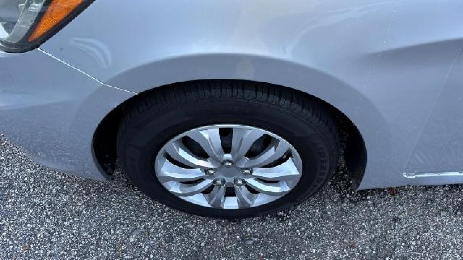 2015 Silver Hyundai Accent GLS (KMHCT4AE8FU) with an 1.6L I-4 gasoline direct injection engine, located at 1806 Veterans Memorial Hwy SW, Austell, GA, 30168, (770) 944-9558, 33.817959, -84.606987 - Photo#14