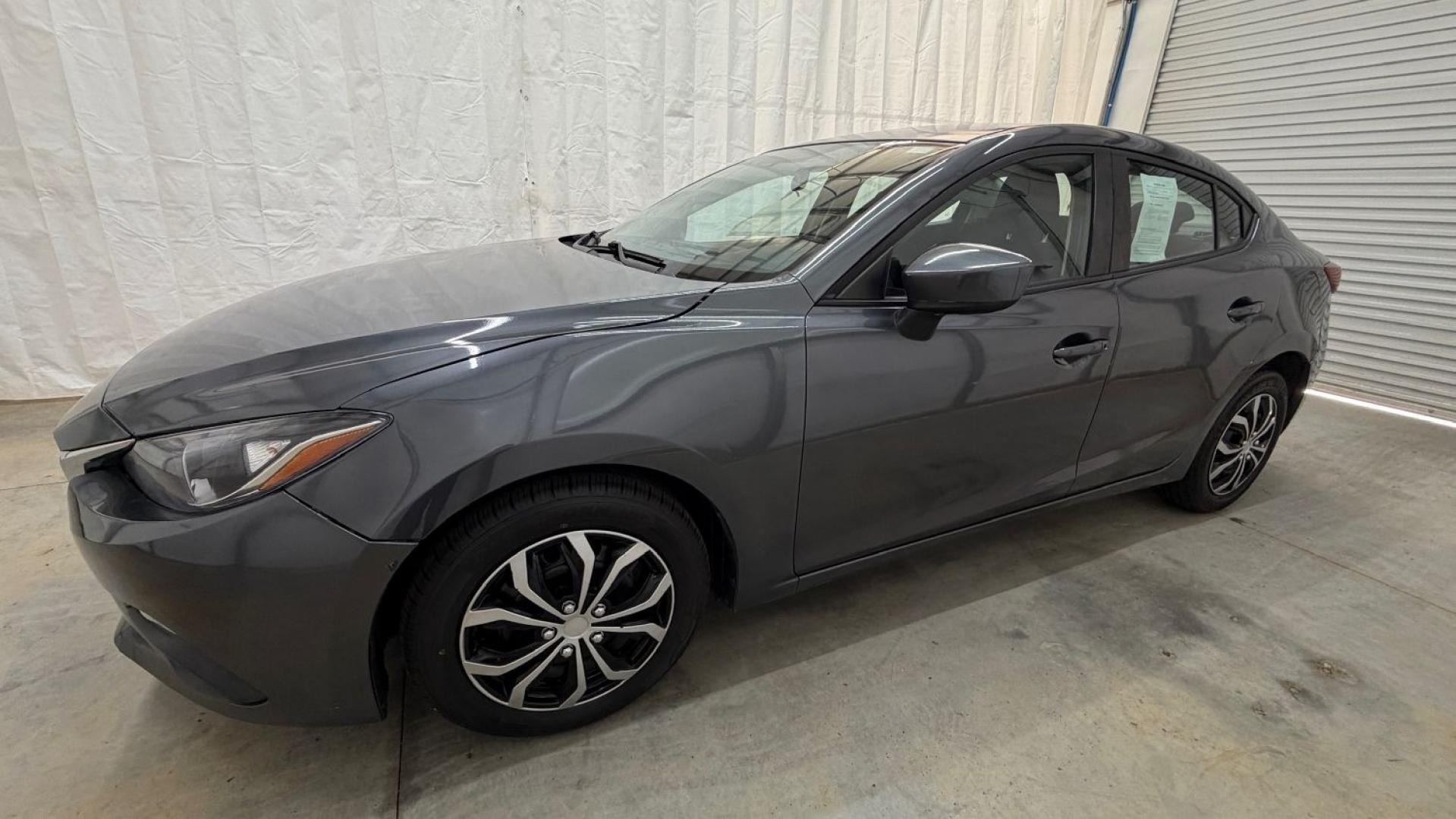 2014 Gray Mazda Mazda3 i Sport (JM1BM1U76E1) with an SKYACTIV-G 2L I-4 ga engine, located at 1806 Veterans Memorial Hwy SW, Austell, GA, 30168, (770) 944-9558, 33.817959, -84.606987- Photo#1