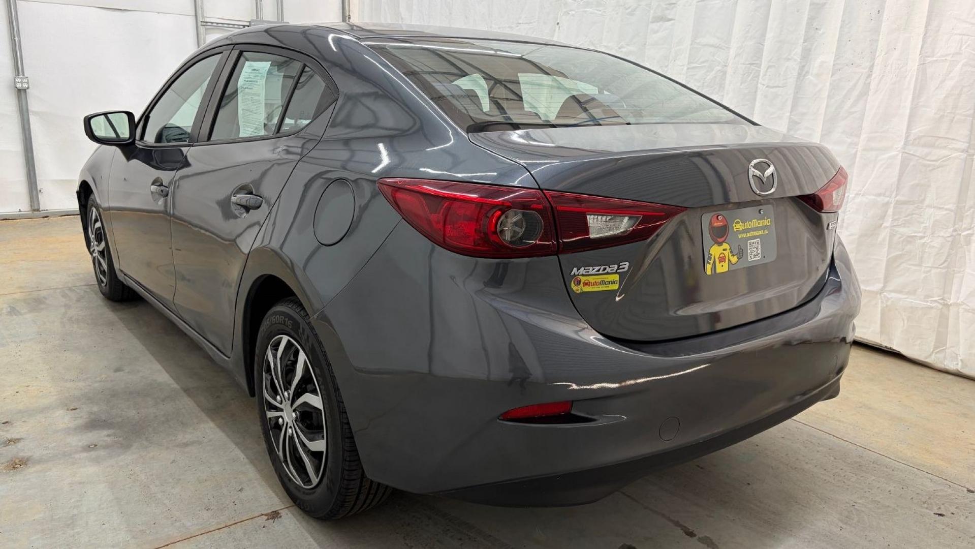 2014 Gray Mazda Mazda3 i Sport (JM1BM1U76E1) with an SKYACTIV-G 2L I-4 ga engine, located at 1806 Veterans Memorial Hwy SW, Austell, GA, 30168, (770) 944-9558, 33.817959, -84.606987- Photo#3
