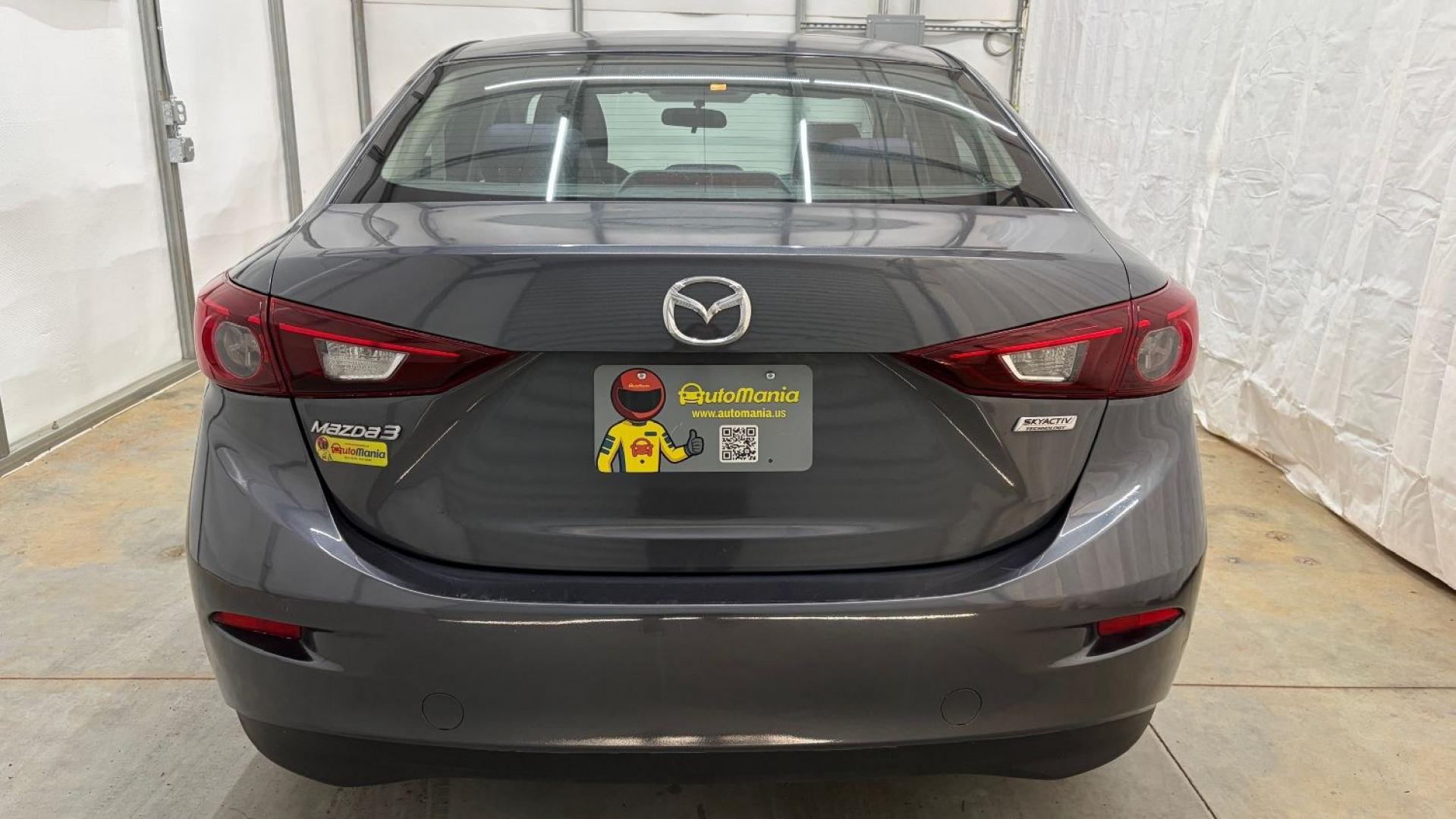 2014 Gray Mazda Mazda3 i Sport (JM1BM1U76E1) with an SKYACTIV-G 2L I-4 ga engine, located at 1806 Veterans Memorial Hwy SW, Austell, GA, 30168, (770) 944-9558, 33.817959, -84.606987- Photo#4