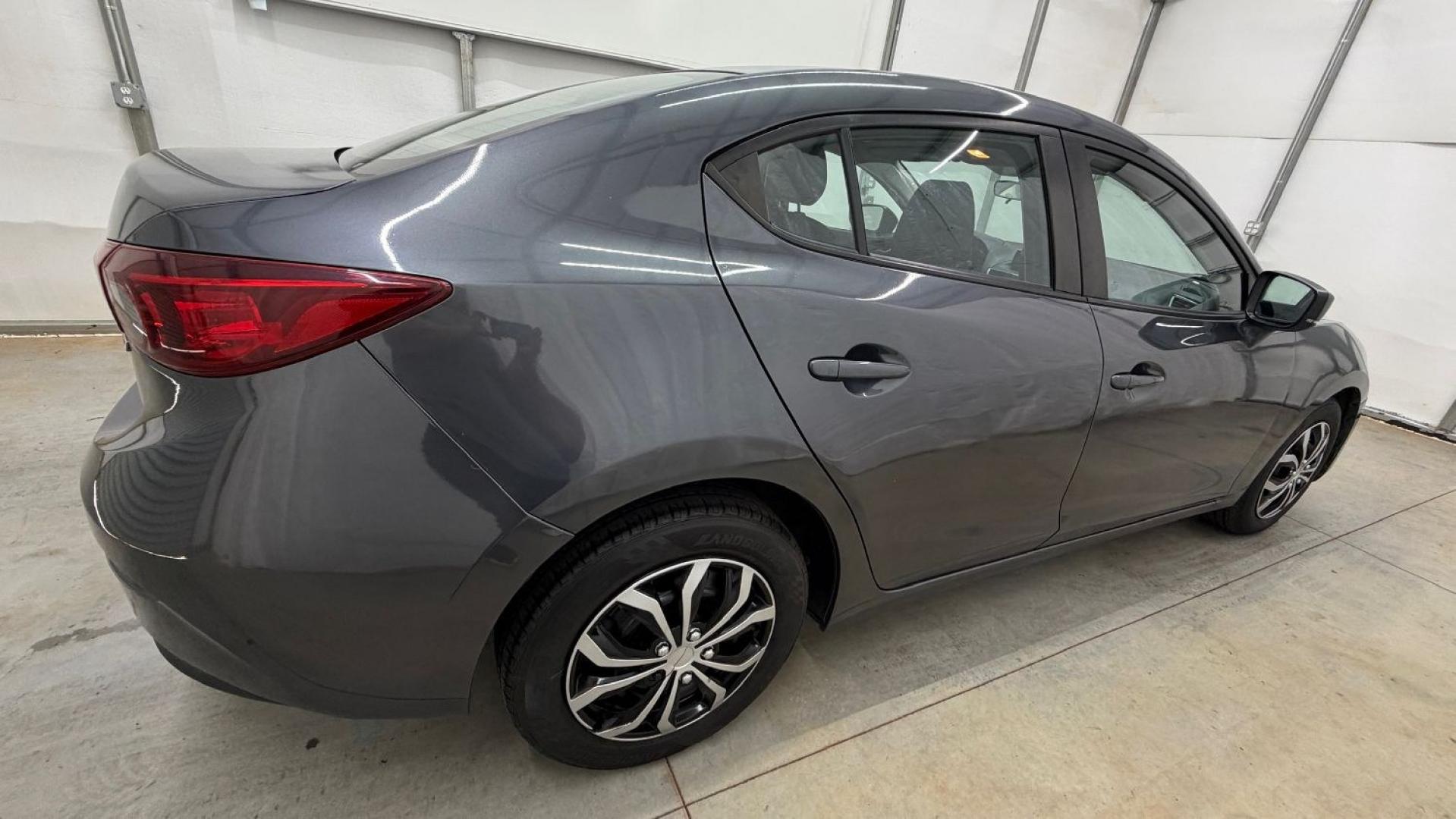 2014 Gray Mazda Mazda3 i Sport (JM1BM1U76E1) with an SKYACTIV-G 2L I-4 ga engine, located at 1806 Veterans Memorial Hwy SW, Austell, GA, 30168, (770) 944-9558, 33.817959, -84.606987- Photo#6