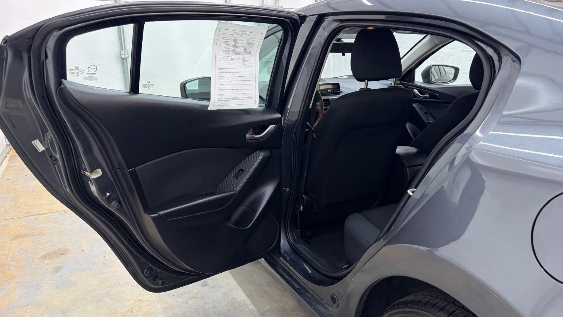 2014 Gray Mazda Mazda3 i Sport (JM1BM1U76E1) with an SKYACTIV-G 2L I-4 ga engine, located at 1806 Veterans Memorial Hwy SW, Austell, GA, 30168, (770) 944-9558, 33.817959, -84.606987- Photo#13