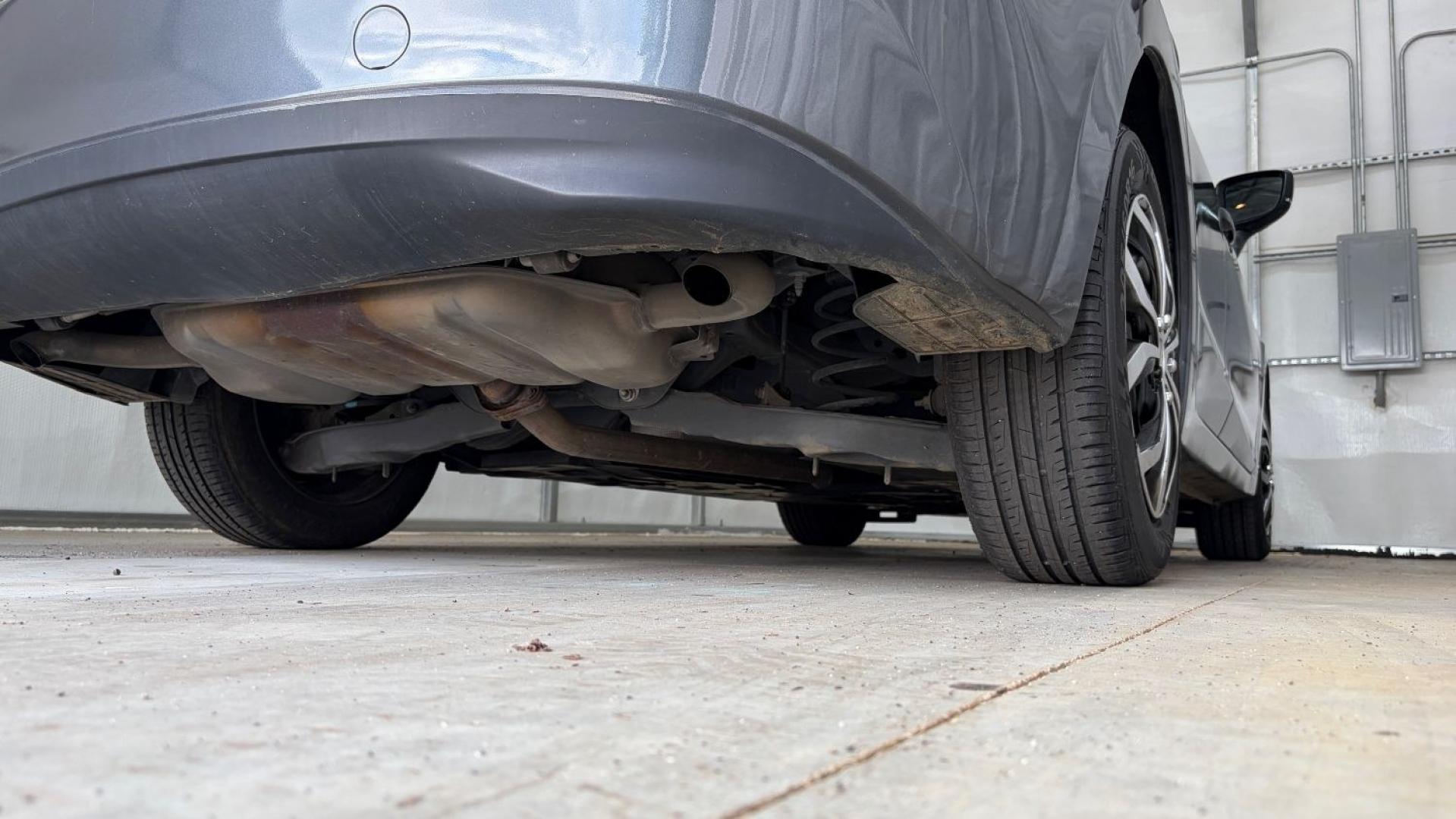 2014 Gray Mazda Mazda3 i Sport (JM1BM1U76E1) with an SKYACTIV-G 2L I-4 ga engine, located at 1806 Veterans Memorial Hwy SW, Austell, GA, 30168, (770) 944-9558, 33.817959, -84.606987- Photo#21