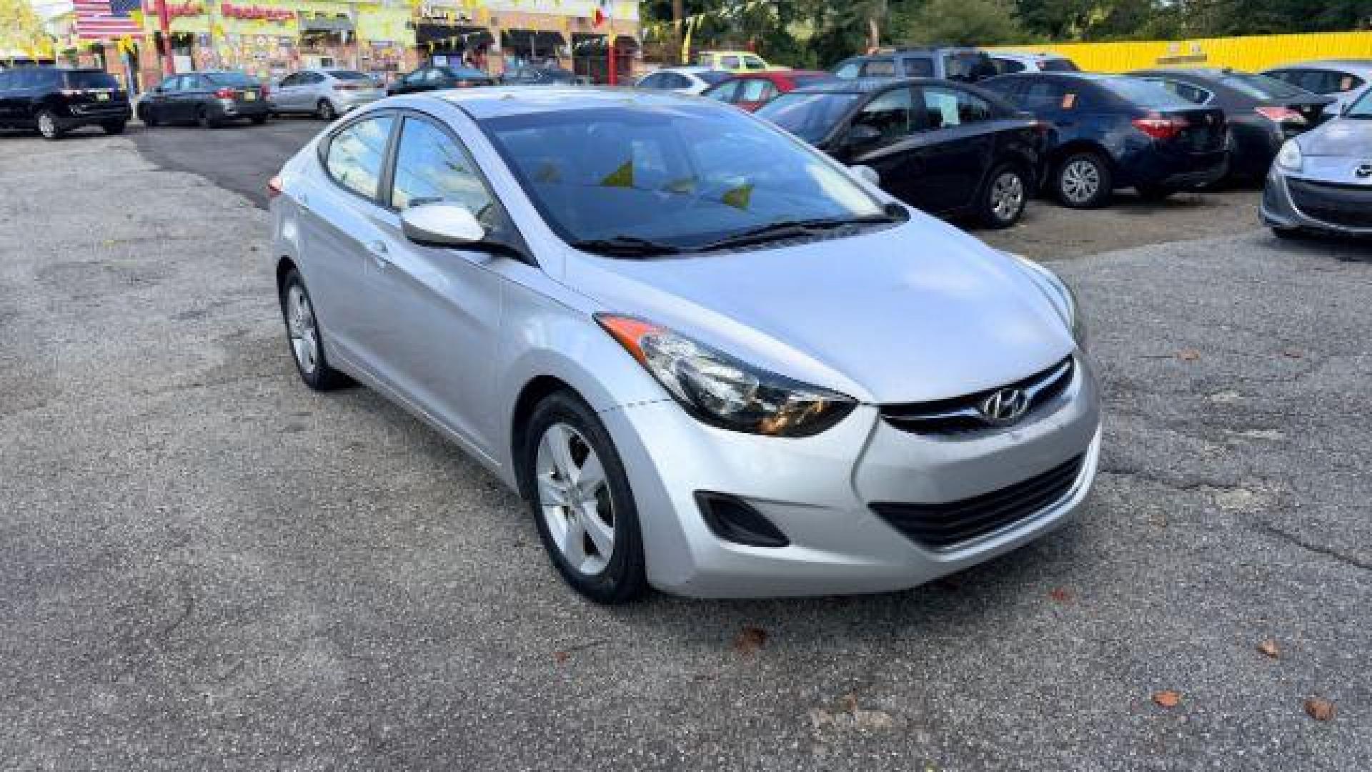 2011 Silver Hyundai Elantra GLS (Ulsan Plant) (KMHDH4AE2BU) with an 1.8L I-4 DOHC engine, located at 1806 Veterans Memorial Hwy SW, Austell, GA, 30168, (770) 944-9558, 33.817959, -84.606987 - Photo#2