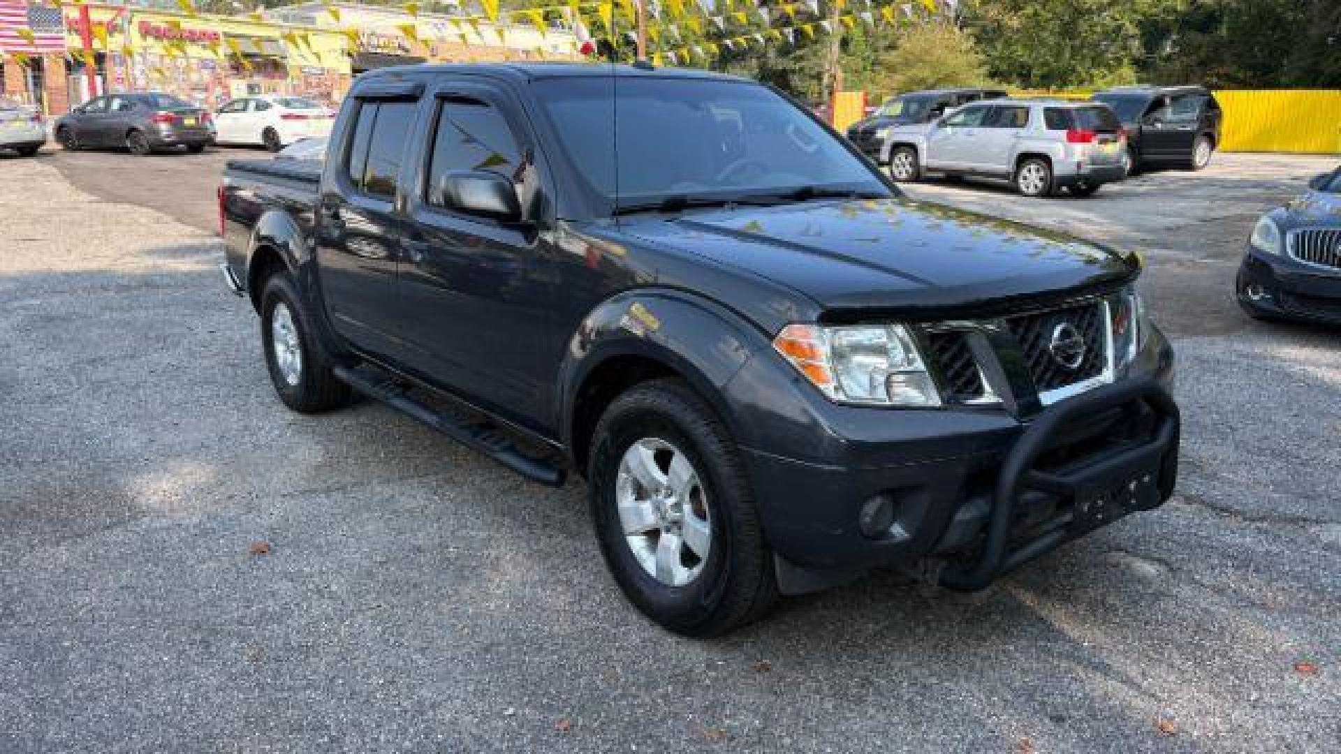2013 Gray Nissan Frontier SV (1N6AD0ERXDN) with an VQ 4L V-6 DOHC engine, located at 1806 Veterans Memorial Hwy SW, Austell, GA, 30168, (770) 944-9558, 33.817959, -84.606987 - Photo#2