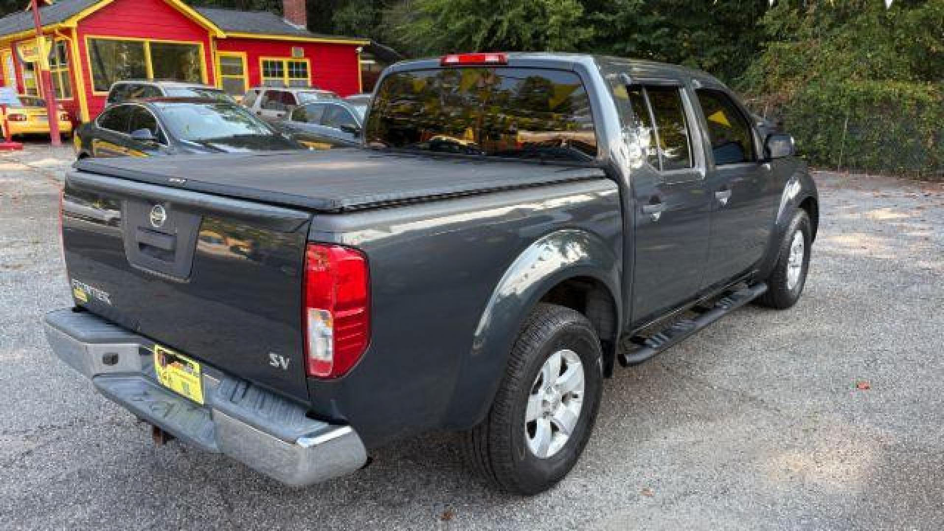 2013 Gray Nissan Frontier SV (1N6AD0ERXDN) with an VQ 4L V-6 DOHC engine, located at 1806 Veterans Memorial Hwy SW, Austell, GA, 30168, (770) 944-9558, 33.817959, -84.606987 - Photo#3