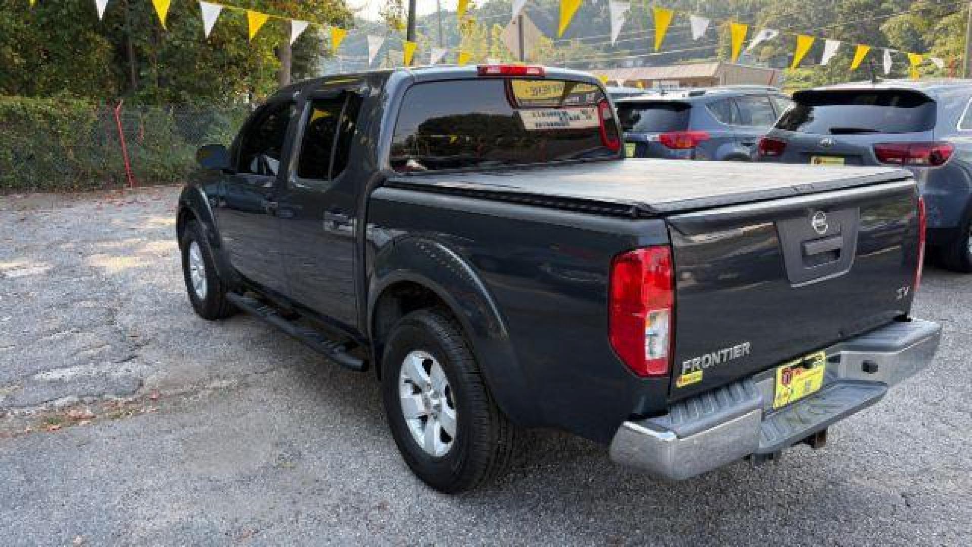 2013 Gray Nissan Frontier SV (1N6AD0ERXDN) with an VQ 4L V-6 DOHC engine, located at 1806 Veterans Memorial Hwy SW, Austell, GA, 30168, (770) 944-9558, 33.817959, -84.606987 - Photo#5