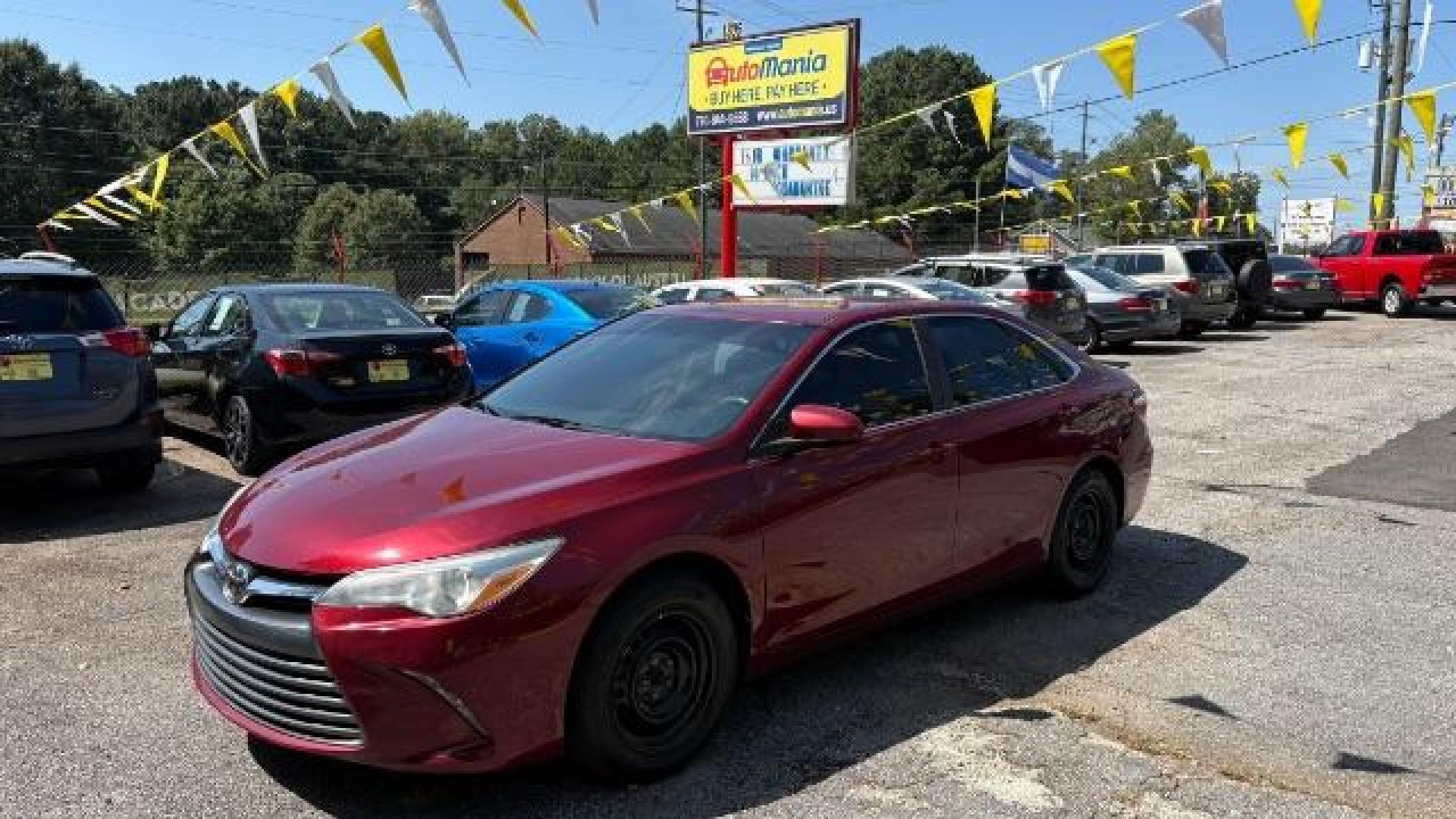2017 RED Toyota Camry LE (4T1BF1FK6HU) with an 2.5L I-4 DOHC engine, located at 1806 Veterans Memorial Hwy SW, Austell, GA, 30168, (770) 944-9558, 33.817959, -84.606987 - Photo#0