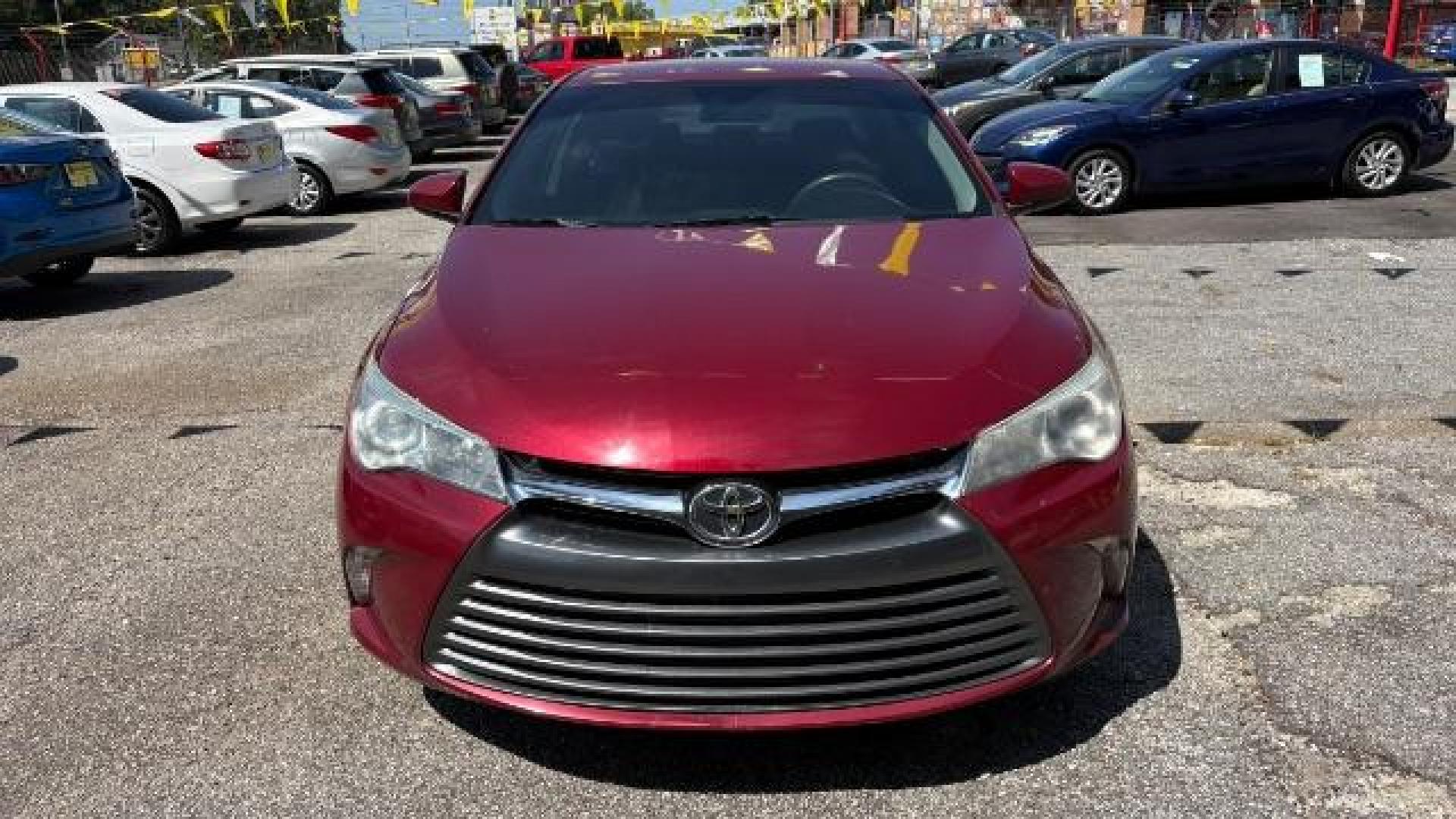 2017 RED Toyota Camry LE (4T1BF1FK6HU) with an 2.5L I-4 DOHC engine, located at 1806 Veterans Memorial Hwy SW, Austell, GA, 30168, (770) 944-9558, 33.817959, -84.606987 - Photo#1