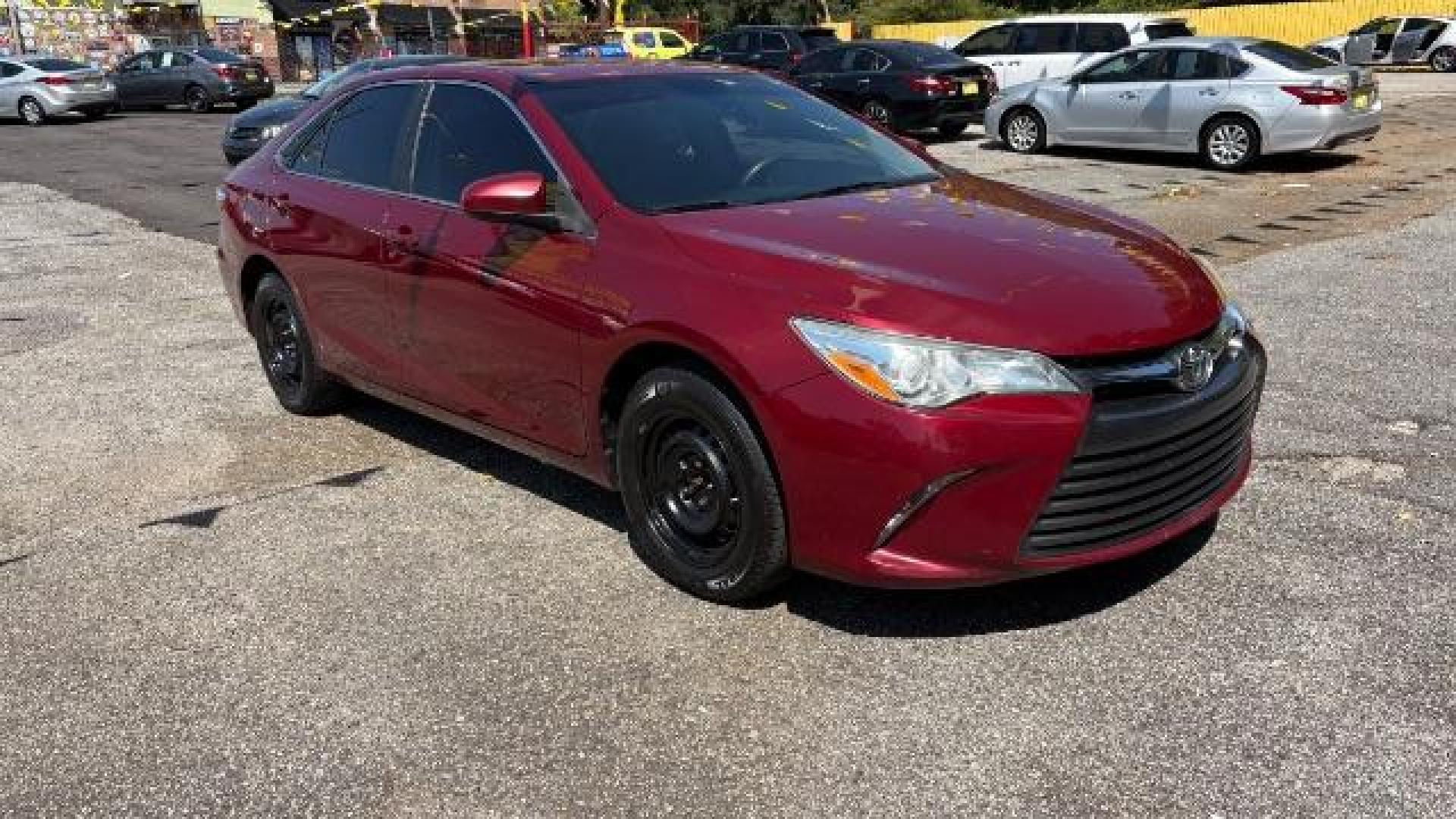 2017 RED Toyota Camry LE (4T1BF1FK6HU) with an 2.5L I-4 DOHC engine, located at 1806 Veterans Memorial Hwy SW, Austell, GA, 30168, (770) 944-9558, 33.817959, -84.606987 - Photo#2