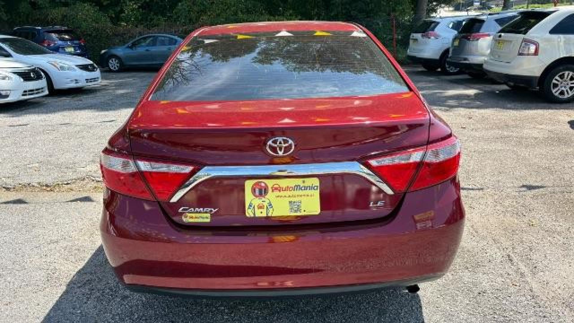 2017 RED Toyota Camry LE (4T1BF1FK6HU) with an 2.5L I-4 DOHC engine, located at 1806 Veterans Memorial Hwy SW, Austell, GA, 30168, (770) 944-9558, 33.817959, -84.606987 - Photo#4