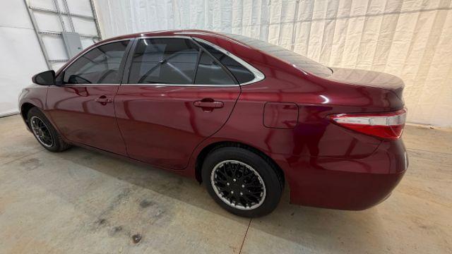 2017 RED Toyota Camry LE (4T1BF1FK6HU) with an 2.5L I-4 DOHC engine, located at 1806 Veterans Memorial Hwy SW, Austell, GA, 30168, (770) 944-9558, 33.817959, -84.606987 - Photo#2
