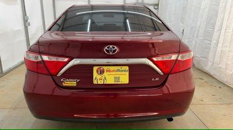 2017 RED Toyota Camry LE (4T1BF1FK6HU) with an 2.5L I-4 DOHC engine, located at 1806 Veterans Memorial Hwy SW, Austell, GA, 30168, (770) 944-9558, 33.817959, -84.606987 - Photo#4