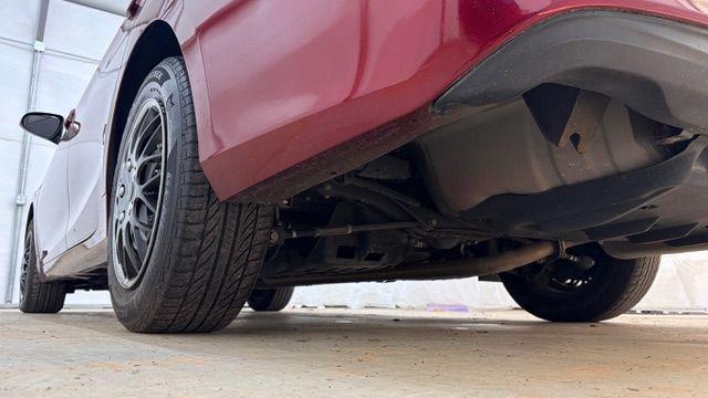 2017 RED Toyota Camry LE (4T1BF1FK6HU) with an 2.5L I-4 DOHC engine, located at 1806 Veterans Memorial Hwy SW, Austell, GA, 30168, (770) 944-9558, 33.817959, -84.606987 - Photo#20